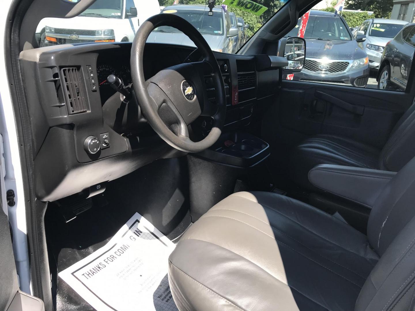2017 White /Gray Chevrolet Express 2500 Cargo (1GCWGAFF2H1) with an 4.8L V8 FFV engine, 6A transmission, located at 577 Chester Pike, Prospect Park, PA, 19076, (610) 237-1015, 39.886154, -75.302338 - 17 Chevy Express 2500 Cargo Van: power locks and windows, partition, new PA inspection, FLEET SERVICED VAN, runs LIKE NEW! This vehicle comes inspected and has been given a bumper to bumper safety check. It is very clean, reliable, and well maintained. We offer a unique pay plan that is known for - Photo#7