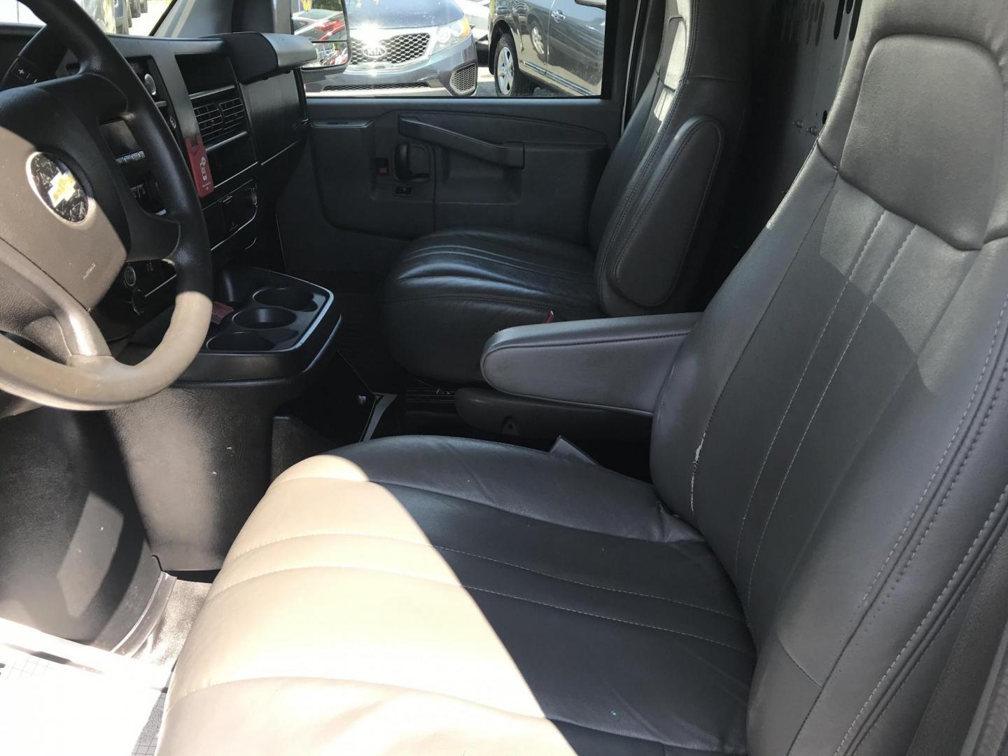 2017 White /Gray Chevrolet Express 2500 Cargo (1GCWGAFF2H1) with an 4.8L V8 FFV engine, 6A transmission, located at 577 Chester Pike, Prospect Park, PA, 19076, (610) 237-1015, 39.886154, -75.302338 - 17 Chevy Express 2500 Cargo Van: power locks and windows, partition, new PA inspection, FLEET SERVICED VAN, runs LIKE NEW! This vehicle comes inspected and has been given a bumper to bumper safety check. It is very clean, reliable, and well maintained. We offer a unique pay plan that is known for - Photo#8
