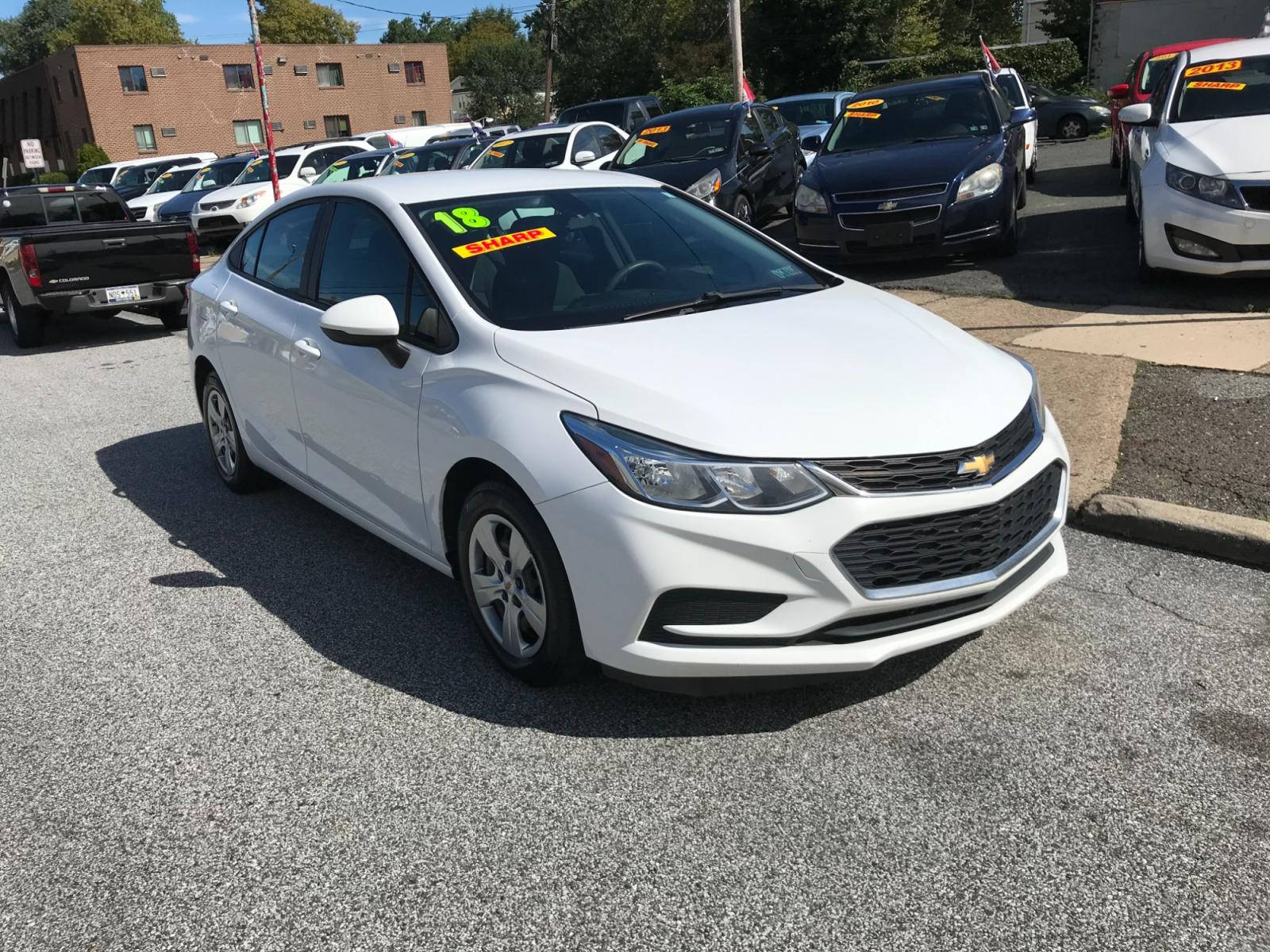 2018 White /Black Chevrolet Cruze LS Auto (1G1BC5SM1J7) with an 1.4L L4 DOHC 16V TURBO engine, 6A transmission, located at 577 Chester Pike, Prospect Park, PA, 19076, (610) 237-1015, 39.886154, -75.302338 - 18 Chevy Cruze LS: Backup camera, 8/24 PA inspection, great on gas, looks and runs LIKE NEW! This vehicle comes inspected and has been given a bumper to bumper safety check. It is very clean, reliable, and well maintained. We offer a unique pay plan that is known for being the easiest and fastest - Photo #2