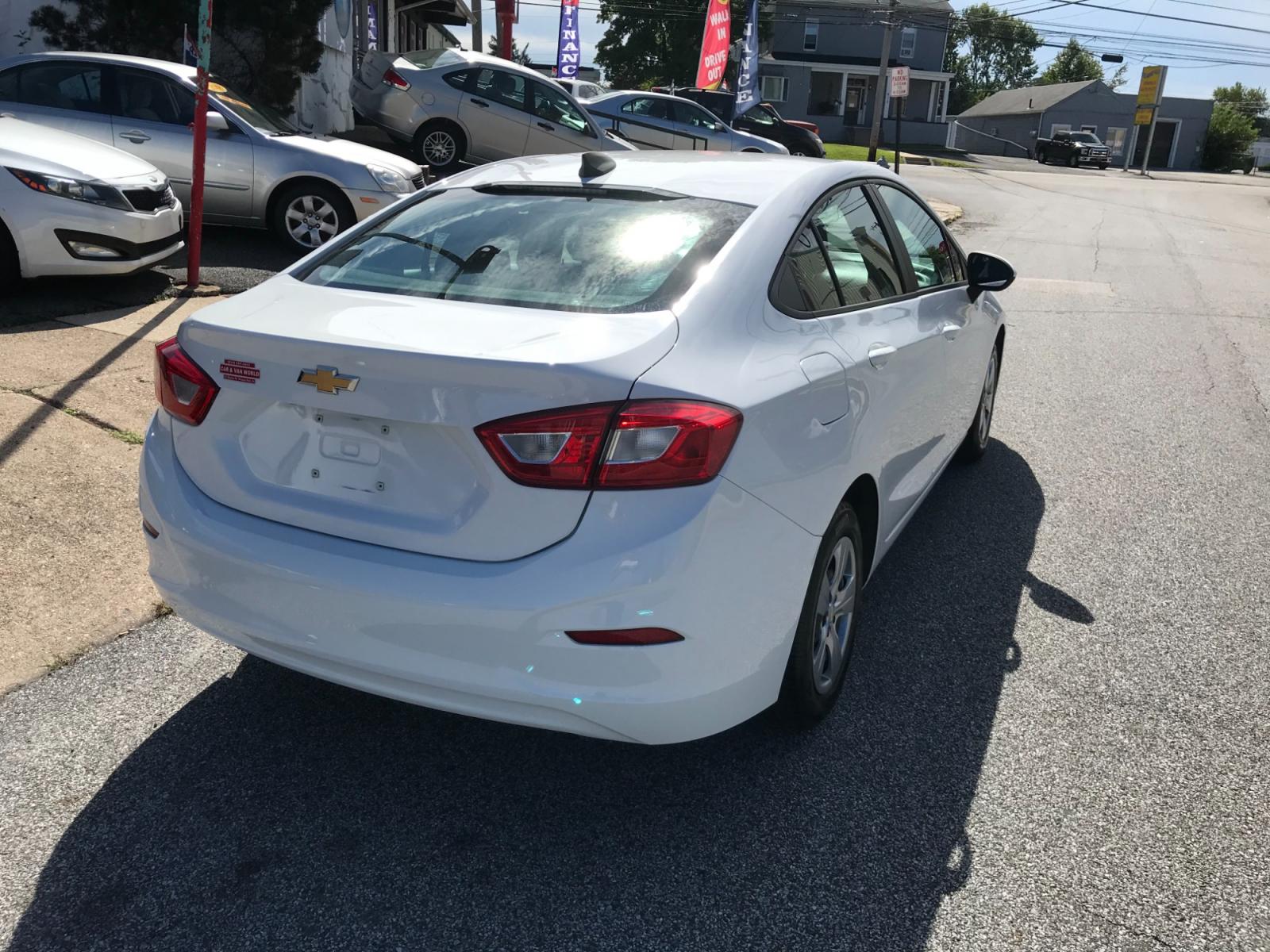 2018 White /Black Chevrolet Cruze LS Auto (1G1BC5SM1J7) with an 1.4L L4 DOHC 16V TURBO engine, 6A transmission, located at 577 Chester Pike, Prospect Park, PA, 19076, (610) 237-1015, 39.886154, -75.302338 - 18 Chevy Cruze LS: Backup camera, 8/24 PA inspection, great on gas, looks and runs LIKE NEW! This vehicle comes inspected and has been given a bumper to bumper safety check. It is very clean, reliable, and well maintained. We offer a unique pay plan that is known for being the easiest and fastest - Photo #6