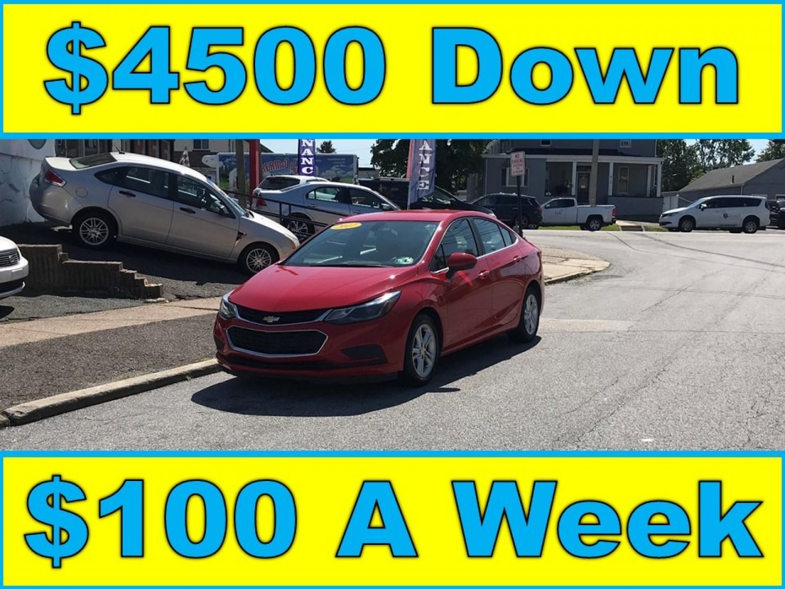 2017 Red /Gray Chevrolet Cruze LT Auto (1G1BE5SM0H7) with an 1.4L L4 DOHC 16V TURBO engine, 6A transmission, located at 577 Chester Pike, Prospect Park, PA, 19076, (610) 237-1015, 39.886154, -75.302338 - Photo #1