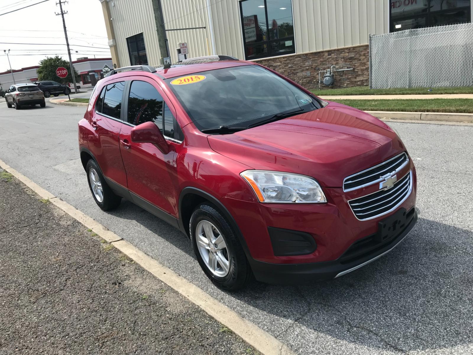 2015 Red /Gray Chevrolet Trax LT AWD (KL7CJRSB0FB) with an 1.4L L4 DOHC 16V FFV engine, Automatic transmission, located at 577 Chester Pike, Prospect Park, PA, 19076, (610) 237-1015, 39.886154, -75.302338 - 15 Chevy Trax LT: Only 110k miles, AWD, sunroof, backup camera, SUPER CLEAN! This vehicle comes inspected and has been given a bumper to bumper safety check. It is very clean, reliable, and well maintained. We offer a unique pay plan that is known for being the easiest and fastest financing optio - Photo #2