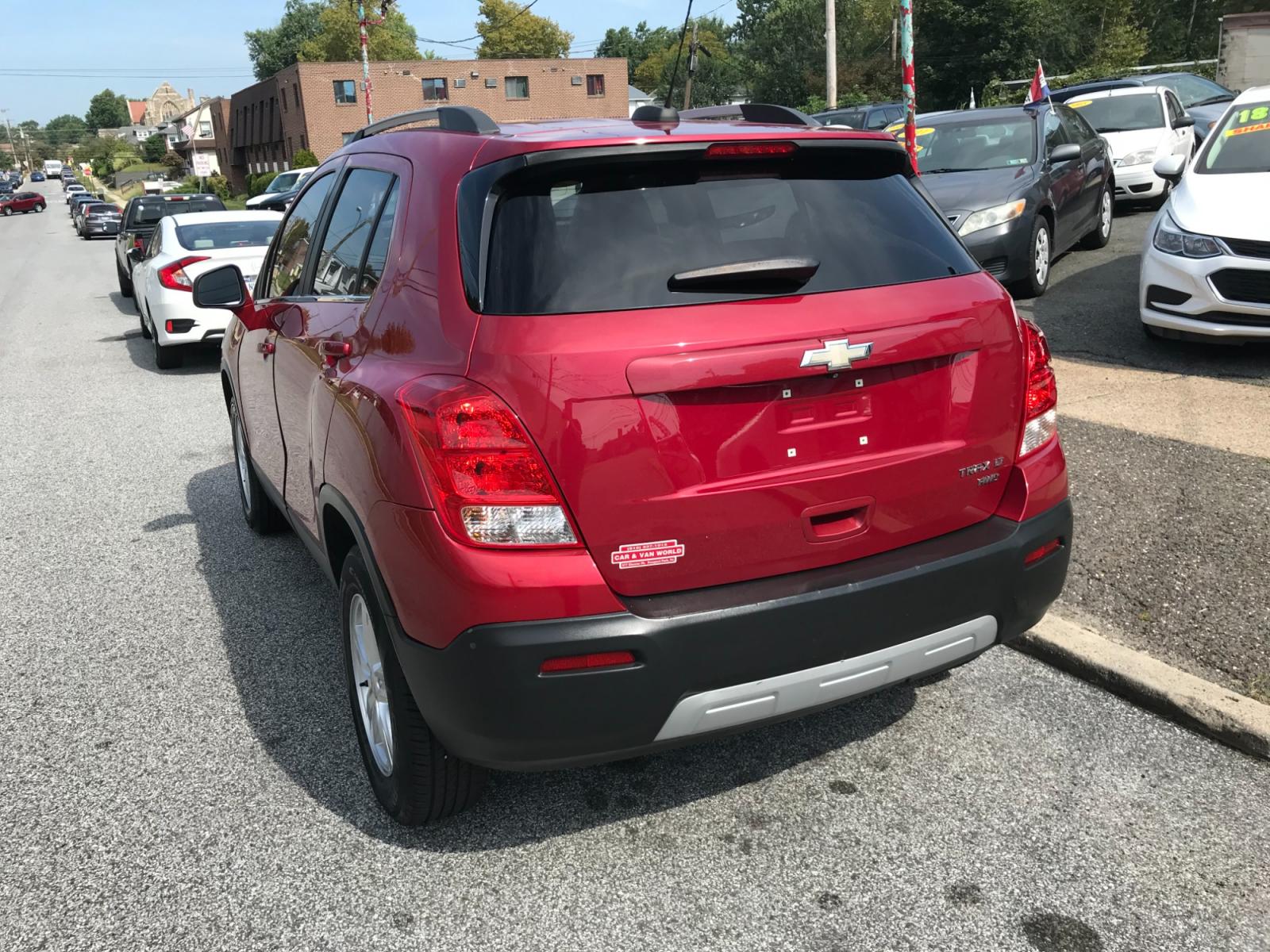 2015 Red /Gray Chevrolet Trax LT AWD (KL7CJRSB0FB) with an 1.4L L4 DOHC 16V FFV engine, Automatic transmission, located at 577 Chester Pike, Prospect Park, PA, 19076, (610) 237-1015, 39.886154, -75.302338 - 15 Chevy Trax LT: Only 110k miles, AWD, sunroof, backup camera, SUPER CLEAN! This vehicle comes inspected and has been given a bumper to bumper safety check. It is very clean, reliable, and well maintained. We offer a unique pay plan that is known for being the easiest and fastest financing optio - Photo #4