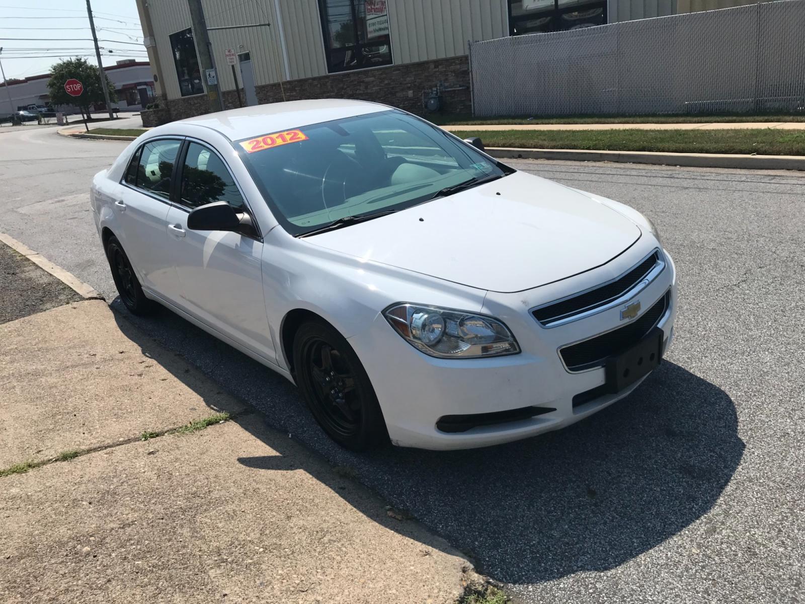 2012 White /Tan Chevrolet Malibu (1G1ZA5EU7CF) with an 2.4L L4 DOHC 16V FFV engine, 6-Speed Automatic transmission, located at 577 Chester Pike, Prospect Park, PA, 19076, (610) 237-1015, 39.886154, -75.302338 - Photo #4