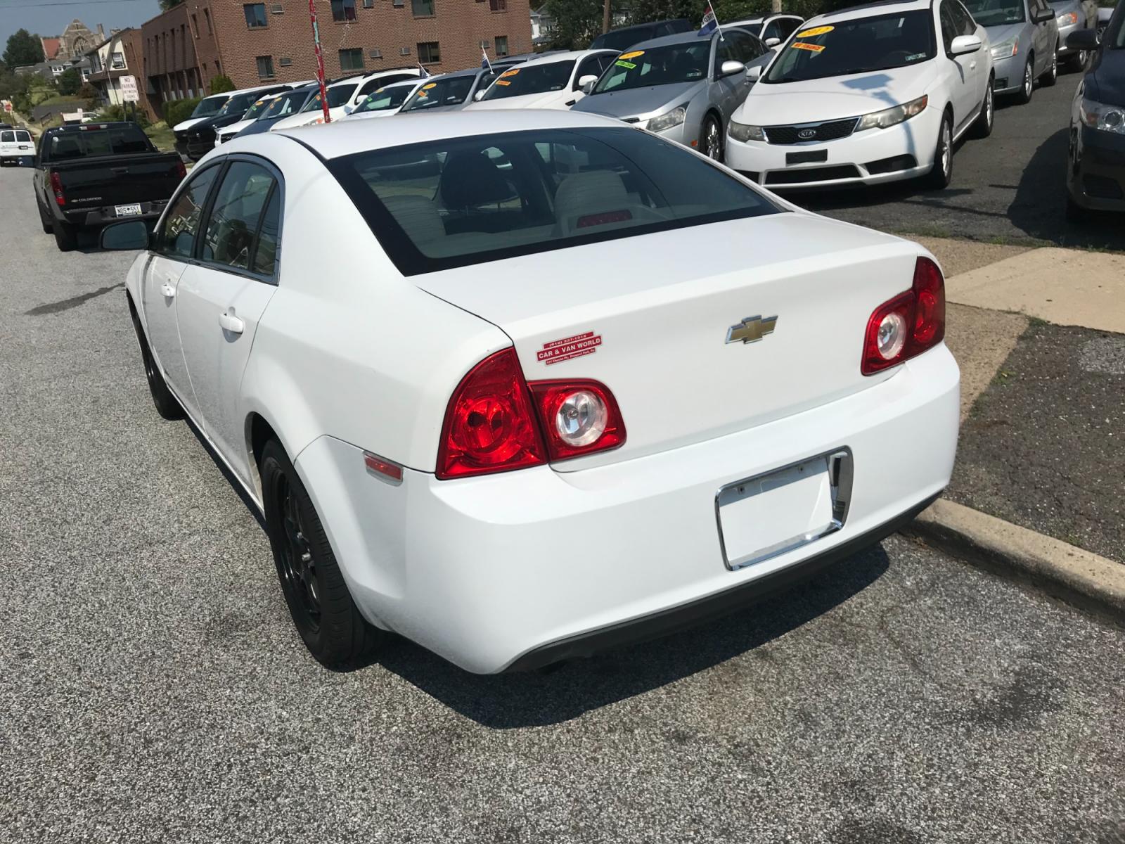 2012 White /Tan Chevrolet Malibu (1G1ZA5EU7CF) with an 2.4L L4 DOHC 16V FFV engine, 6-Speed Automatic transmission, located at 577 Chester Pike, Prospect Park, PA, 19076, (610) 237-1015, 39.886154, -75.302338 - Photo #6