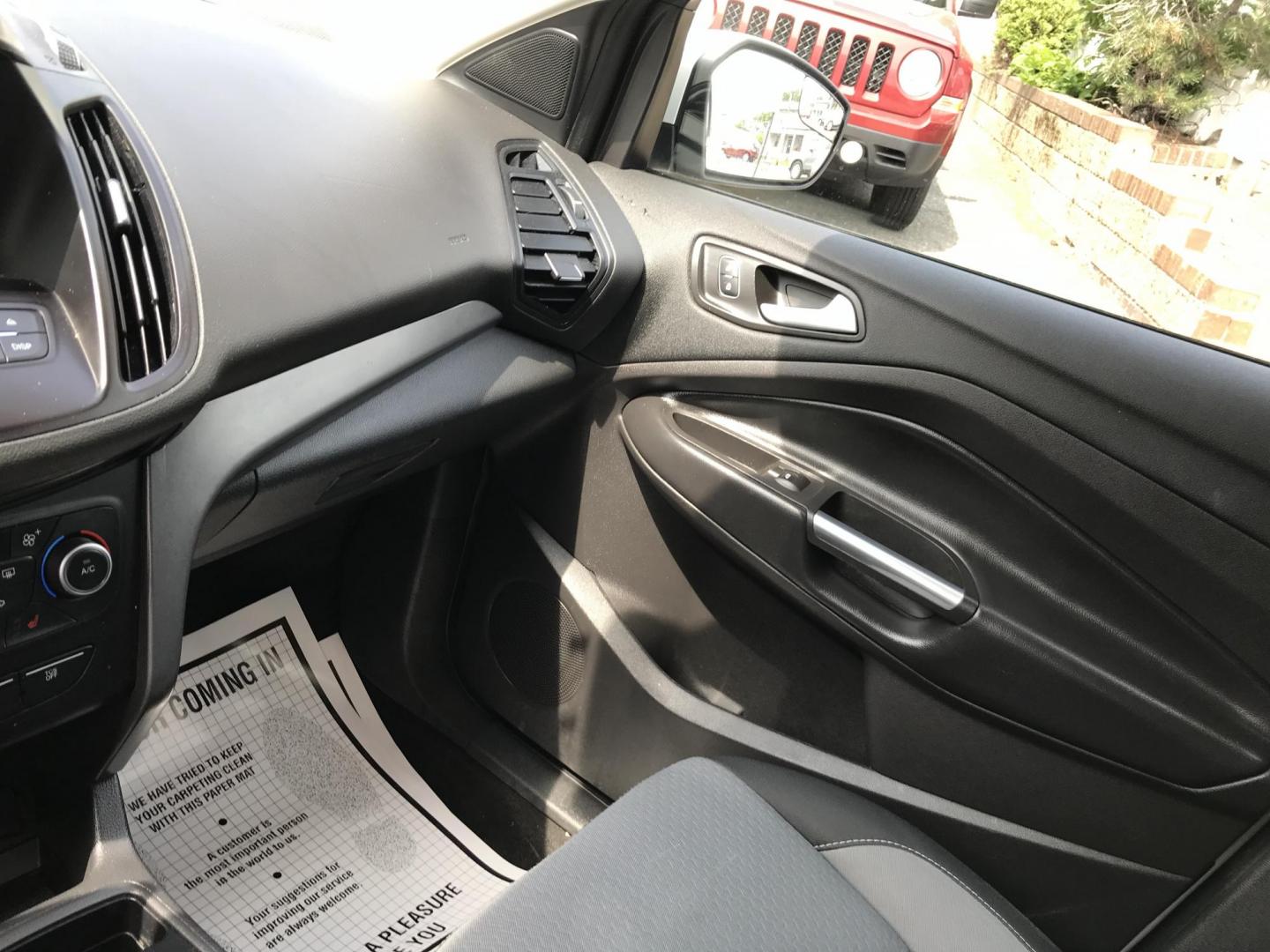 2018 White /Gray Ford Escape SE 4WD (1FMCU9GD7JU) with an 1.5L L4 DOHC 16V engine, 6A transmission, located at 577 Chester Pike, Prospect Park, PA, 19076, (610) 237-1015, 39.886154, -75.302338 - 18 Ford Escape SE: Navigation system, backup camera, looks and runs LIKE NEW! This vehicle comes inspected and has been given a bumper to bumper safety check. It is very clean, reliable, and well maintained. We offer a unique pay plan that is known for being the easiest and fastest financing opti - Photo#17