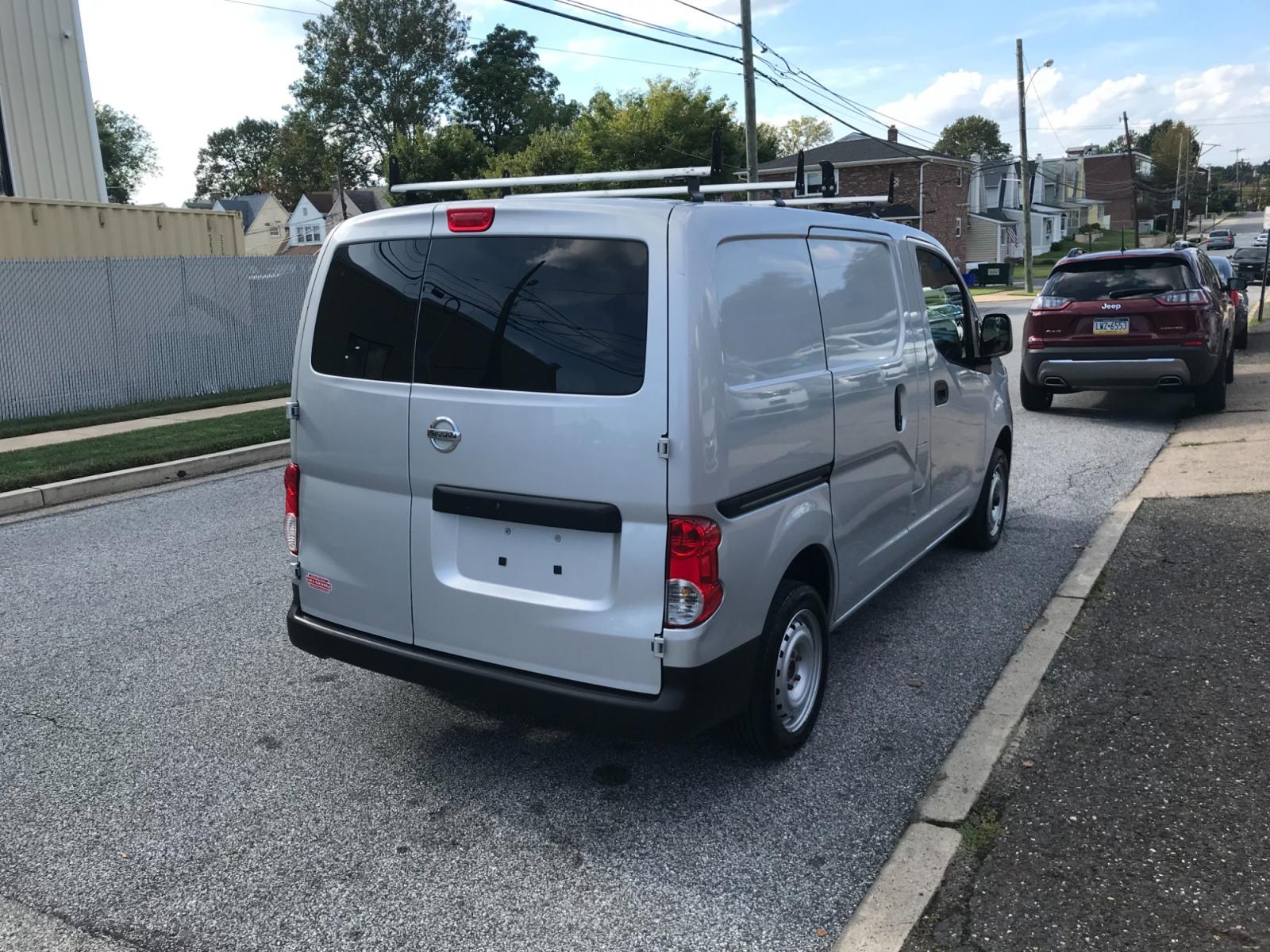 2016 Silver /Gray Nissan NV200 S (3N6CM0KN2GK) with an 2.0L L4 DOHC 16V engine, CVT transmission, located at 577 Chester Pike, Prospect Park, PA, 19076, (610) 237-1015, 39.886154, -75.302338 - 16 Nissan NV200 S Cargo Van: Only 98k miles, ladder racks, partition, shelving, FLEET MAINTAINED, runs LIKE NEW! This vehicle comes inspected and has been given a bumper to bumper safety check. It is very clean, reliable, and well maintained. We offer a unique pay plan that is known for being the - Photo #4