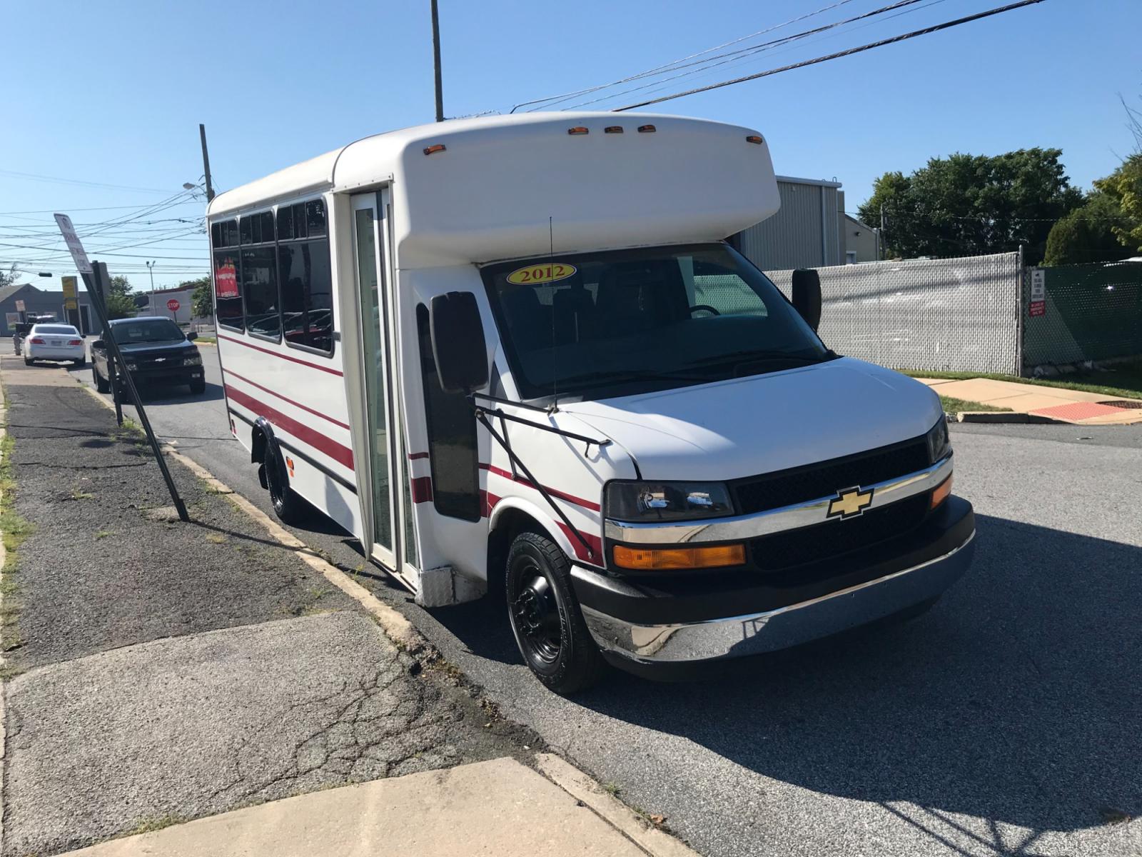 2012 White /Gray Chevrolet Express 3500 BUS (1GB3G3BLXC1) with an 6.6L engine, Automatic transmission, located at 577 Chester Pike, Prospect Park, PA, 19076, (610) 237-1015, 39.886154, -75.302338 - Photo #3