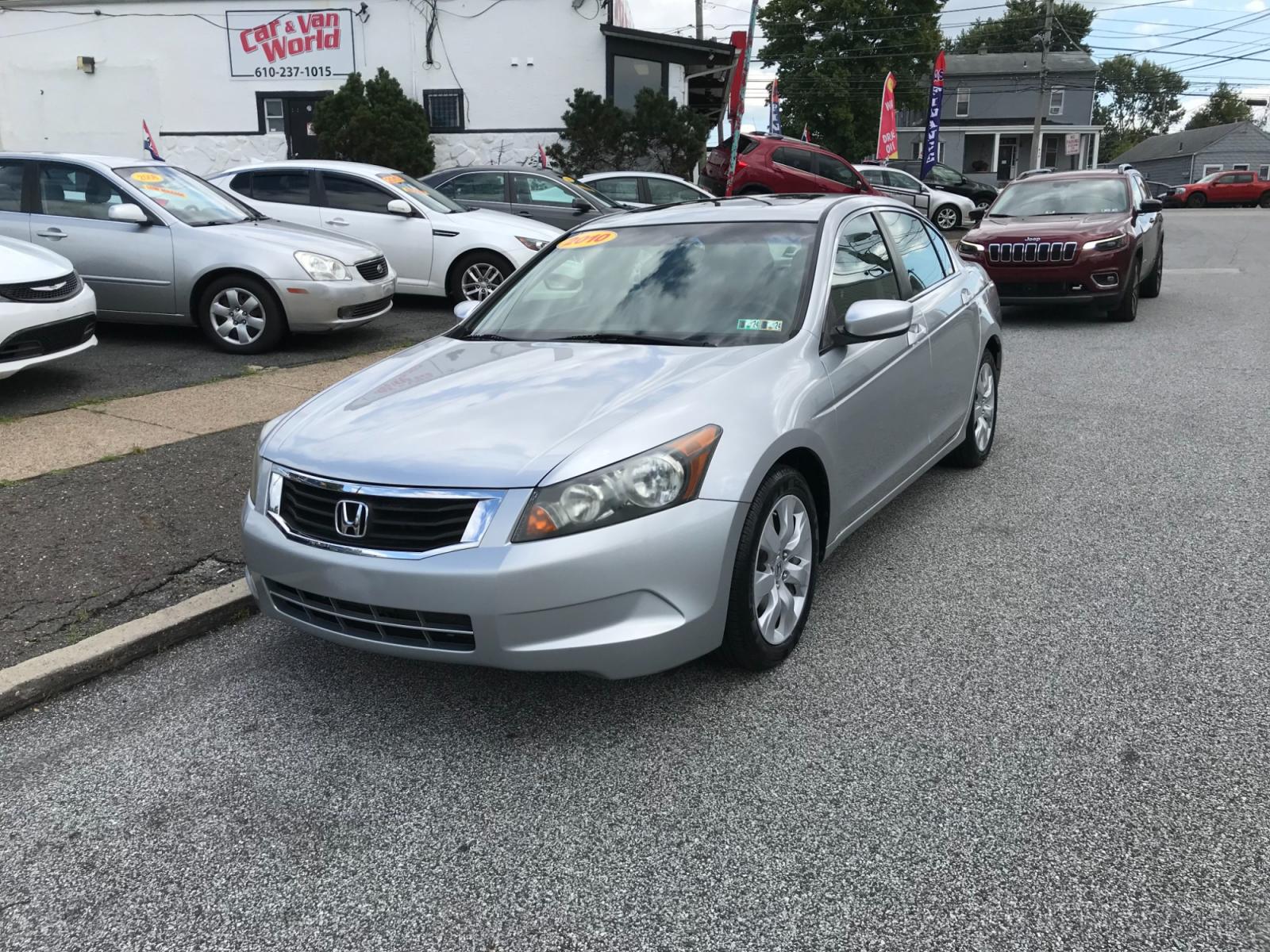 2010 Silver /Gray Honda Accord EX Sedan AT (1HGCP2F76AA) with an 2.4L L4 DOHC 16V engine, 5-Speed Automatic transmission, located at 577 Chester Pike, Prospect Park, PA, 19076, (610) 237-1015, 39.886154, -75.302338 - Photo #2