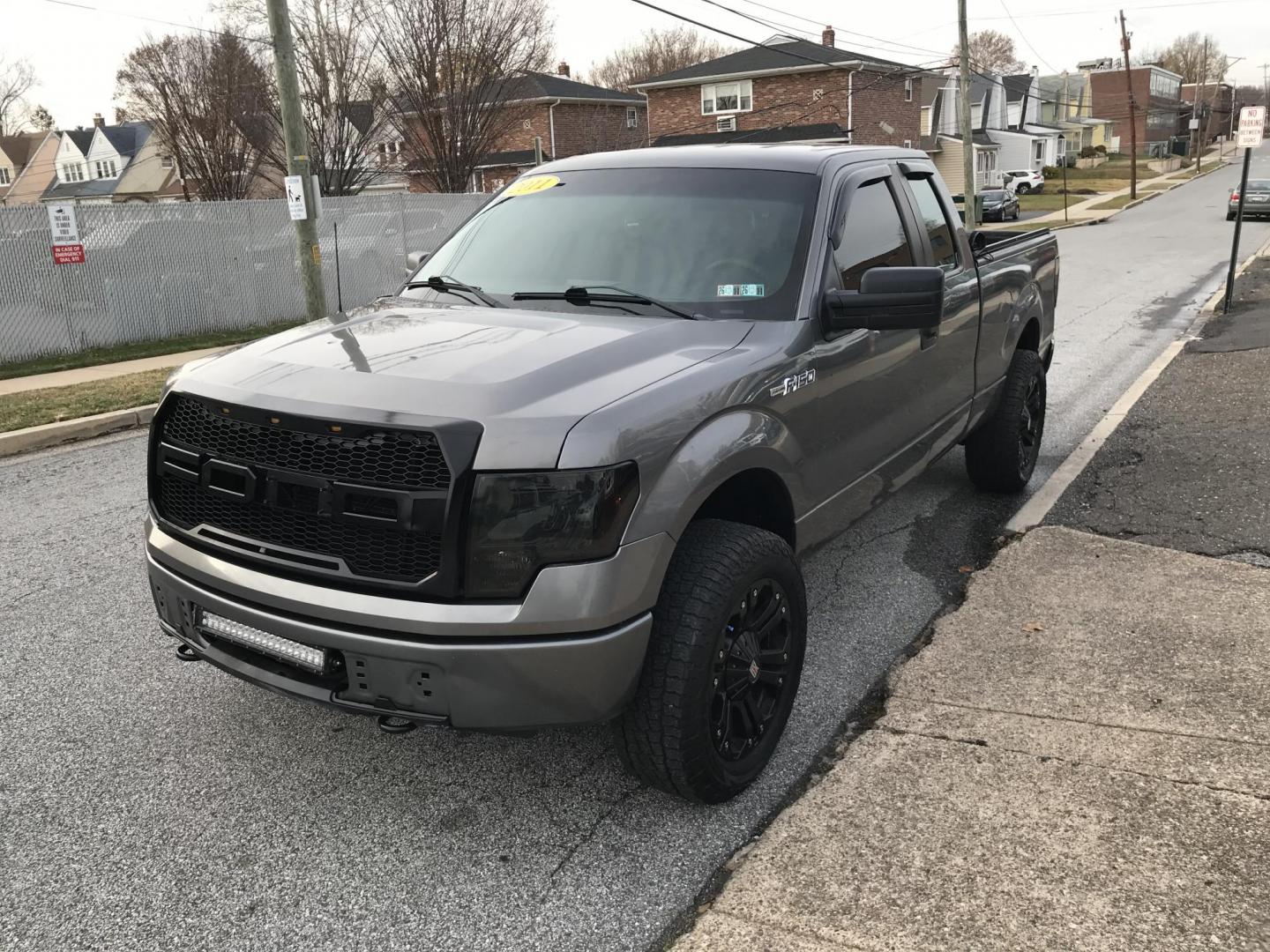 2011 Gray /Gray Ford F-150 FX4 SuperCab 6.5-ft. Bed 4WD (1FTEX1EM8BF) with an 3.7L V6 DOHC 24V engine, 4-Speed Automatic transmission, located at 577 Chester Pike, Prospect Park, PA, 19076, (610) 237-1015, 39.886154, -75.302338 - Photo#1