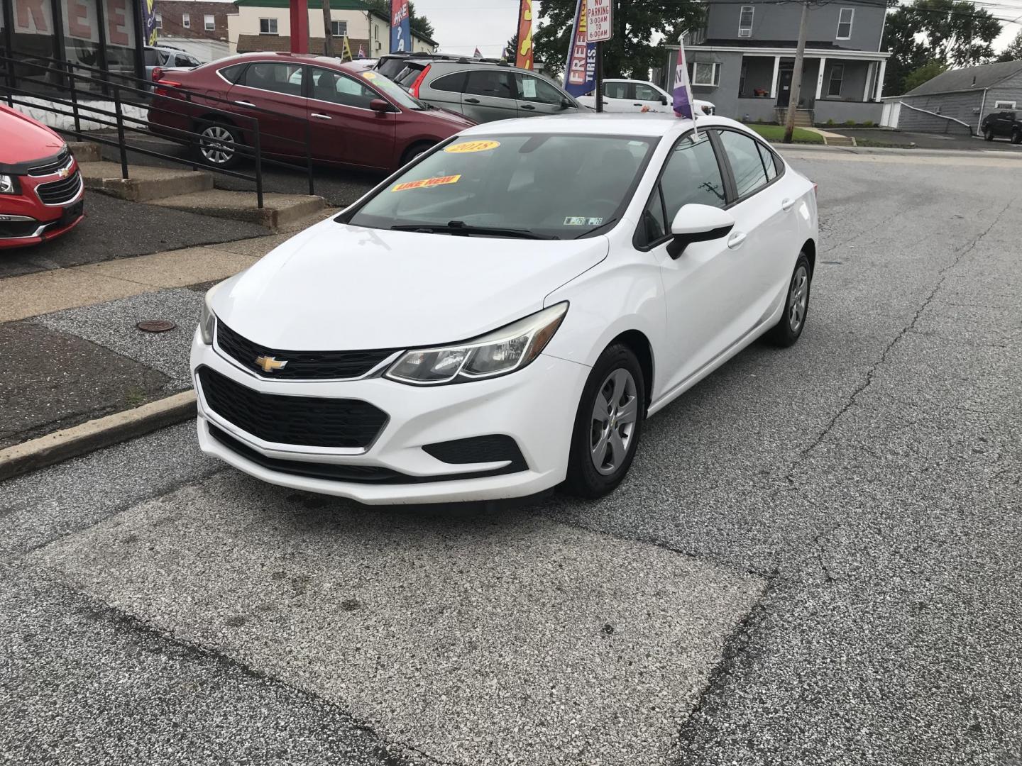 2018 White /Gray Chevrolet Cruze LS Auto (1G1BC5SM9J7) with an 1.4L L4 DOHC 16V TURBO engine, 6A transmission, located at 577 Chester Pike, Prospect Park, PA, 19076, (610) 237-1015, 39.886154, -75.302338 - 18 Chevy Cruze: Backup camera, great on gas, SUPER clean, runs LIKE NEW! This vehicle comes inspected and has been given a bumper to bumper safety check. It is very clean, reliable, and well maintained. We offer a unique pay plan that is known for being the easiest and fastest financing option in - Photo#2