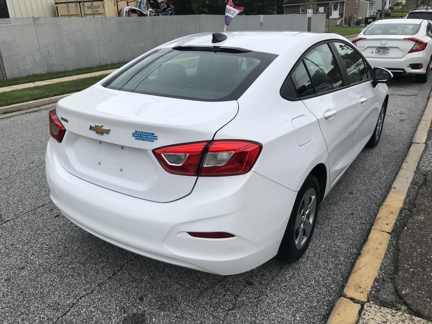 2018 White /Gray Chevrolet Cruze LS Auto (1G1BC5SM9J7) with an 1.4L L4 DOHC 16V TURBO engine, 6A transmission, located at 577 Chester Pike, Prospect Park, PA, 19076, (610) 237-1015, 39.886154, -75.302338 - 18 Chevy Cruze: Backup camera, great on gas, SUPER clean, runs LIKE NEW! This vehicle comes inspected and has been given a bumper to bumper safety check. It is very clean, reliable, and well maintained. We offer a unique pay plan that is known for being the easiest and fastest financing option in - Photo#4