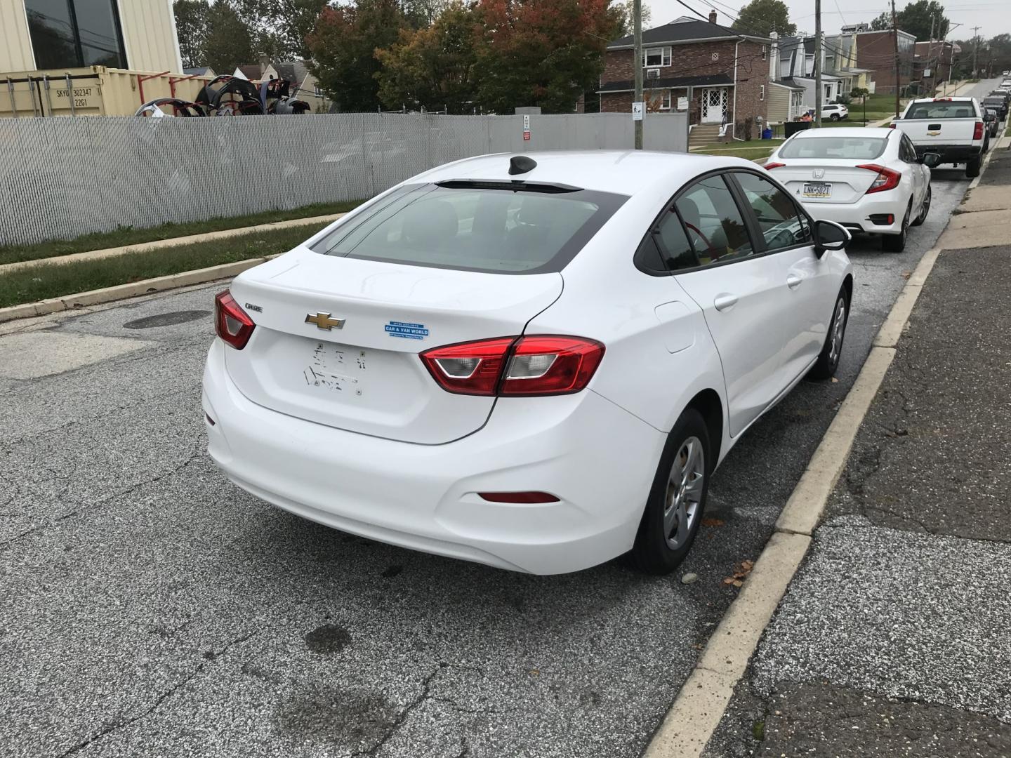 2018 White /Gray Chevrolet Cruze LS Auto (1G1BC5SM9J7) with an 1.4L L4 DOHC 16V TURBO engine, 6A transmission, located at 577 Chester Pike, Prospect Park, PA, 19076, (610) 237-1015, 39.886154, -75.302338 - 18 Chevy Cruze: Backup camera, great on gas, engine and transmission are strong, runs EXCELLENT! *Has a check engine light and needs inspection*- Photo#2