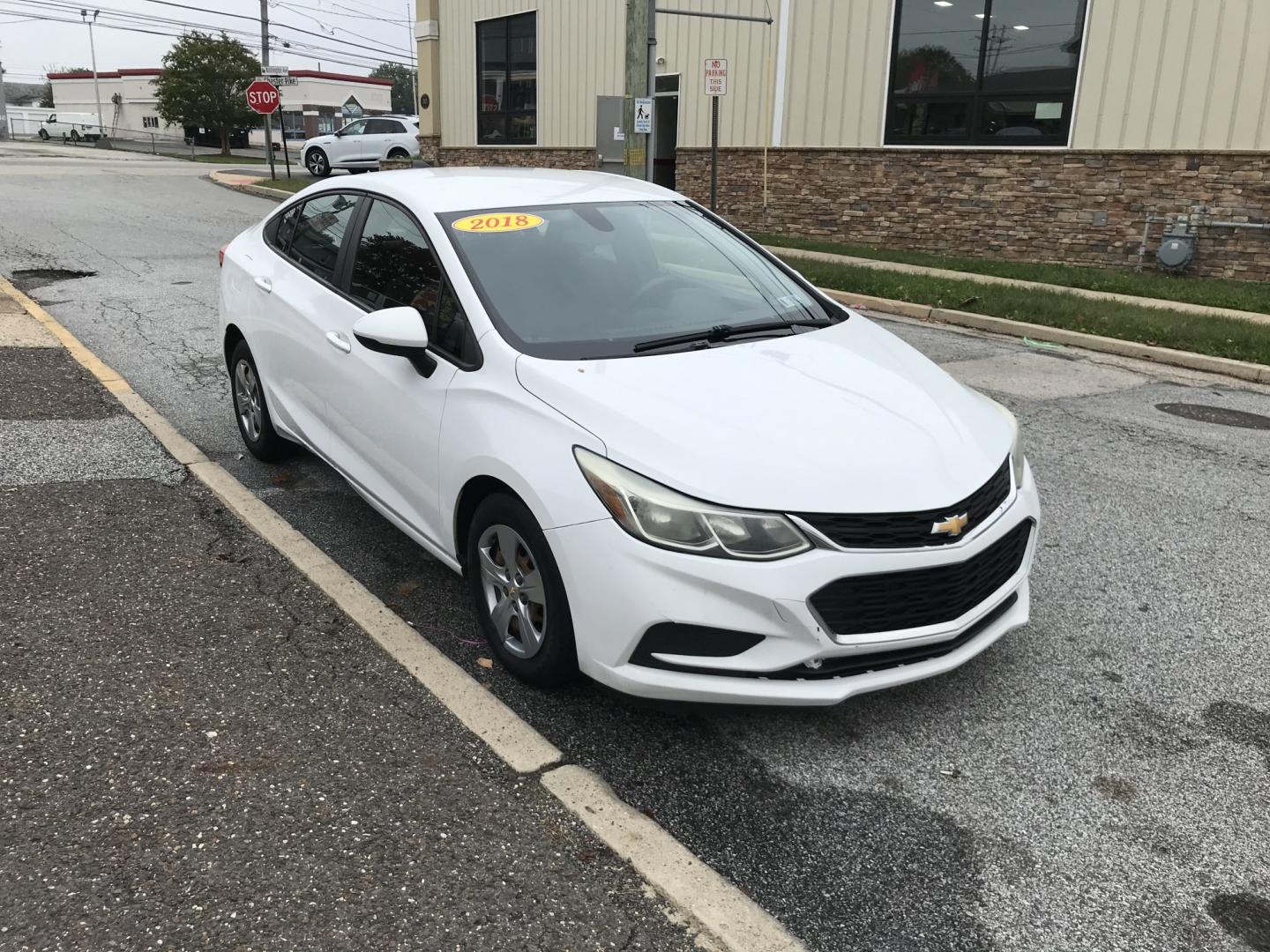 2018 White /Gray Chevrolet Cruze LS Auto (1G1BC5SM9J7) with an 1.4L L4 DOHC 16V TURBO engine, 6A transmission, located at 577 Chester Pike, Prospect Park, PA, 19076, (610) 237-1015, 39.886154, -75.302338 - 18 Chevy Cruze: Backup camera, great on gas, engine and transmission are strong, runs EXCELLENT! *Has a check engine light and needs inspection*- Photo#1