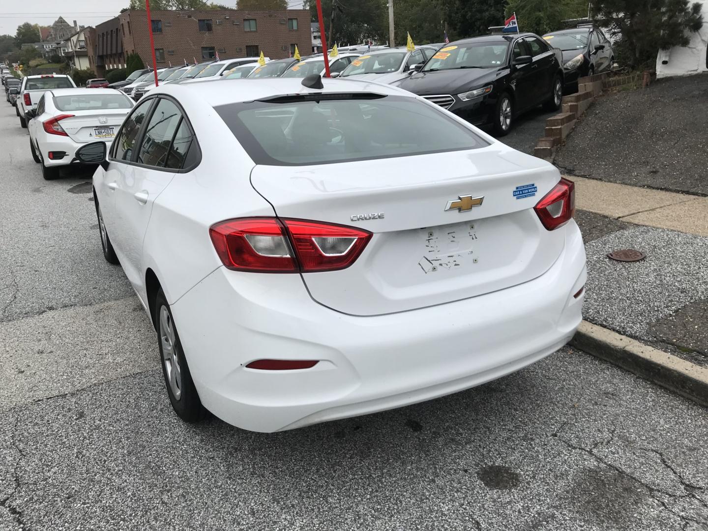 2018 White /Gray Chevrolet Cruze LS Auto (1G1BC5SM9J7) with an 1.4L L4 DOHC 16V TURBO engine, 6A transmission, located at 577 Chester Pike, Prospect Park, PA, 19076, (610) 237-1015, 39.886154, -75.302338 - 18 Chevy Cruze: Backup camera, great on gas, engine and transmission are strong, runs EXCELLENT! *Has a check engine light and needs inspection*- Photo#3