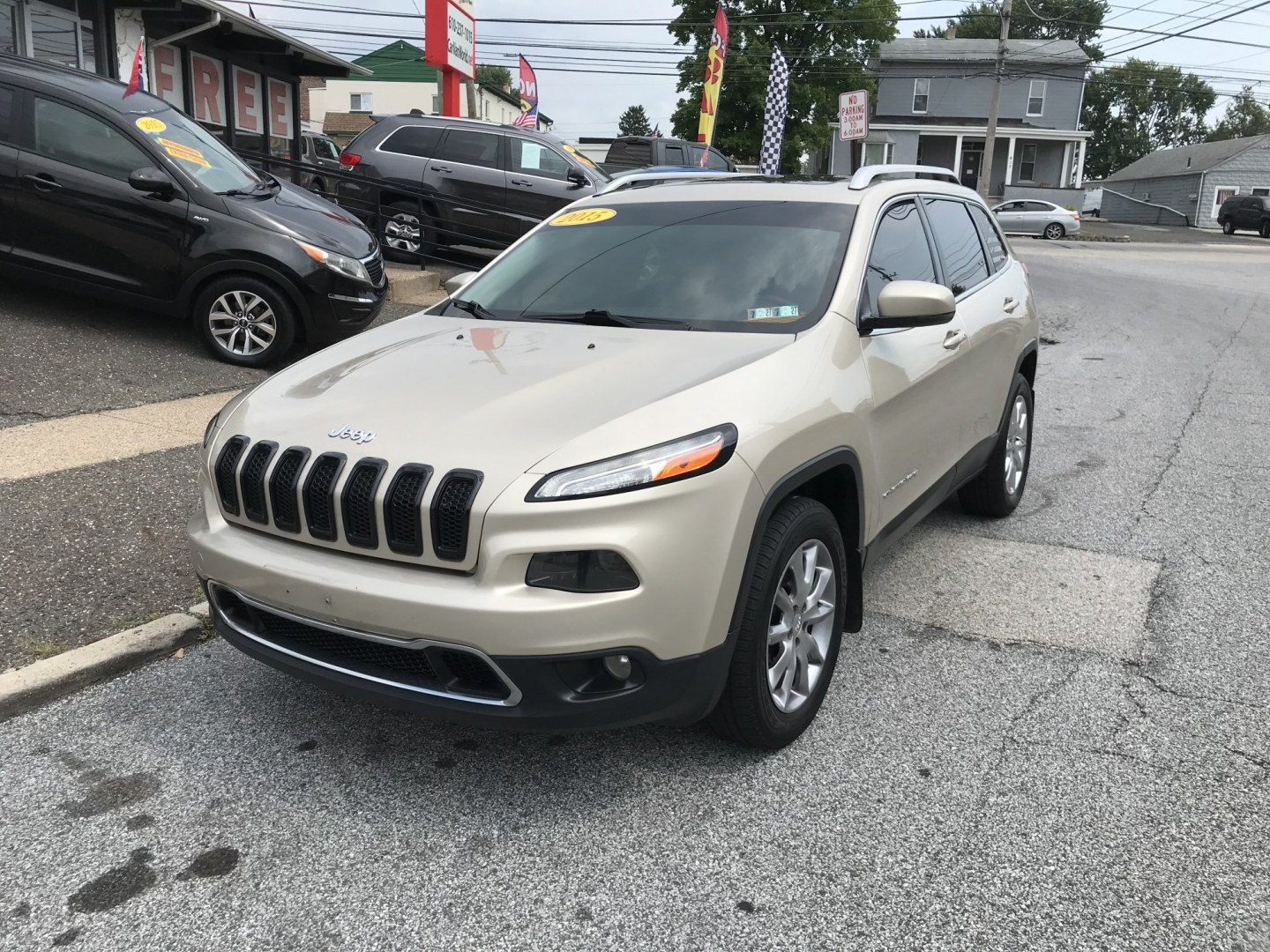 2015 Gold /Black Jeep Cherokee Limited (1C4PJMDS5FW) with an 3.2 V6 engine, Automatic transmission, located at 577 Chester Pike, Prospect Park, PA, 19076, (610) 237-1015, 39.886154, -75.302338 - 2015 Jeep Cherokee LIMITED Navigation System • Sunroof. Example Financing: • $2,500 Down • $100 Weekly • $200 Bi-Weekly We finance our own vehicles. We do not obtain or review traditional consumer credit reports. Financing decisions are based on verified income, ability to repay, and o- Photo#2