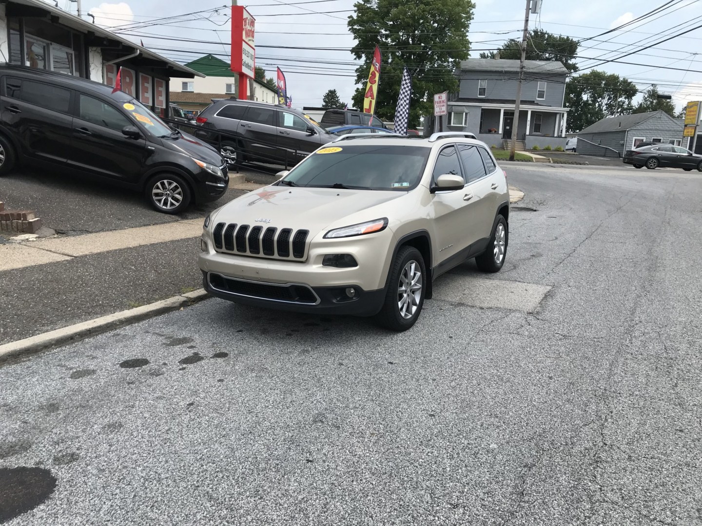 2015 Gold /Black Jeep Cherokee Limited (1C4PJMDS5FW) with an 3.2 V6 engine, Automatic transmission, located at 577 Chester Pike, Prospect Park, PA, 19076, (610) 237-1015, 39.886154, -75.302338 - 2015 Jeep Cherokee LIMITED Navigation System • Sunroof. Example Financing: • $2,500 Down • $100 Weekly • $200 Bi-Weekly We finance our own vehicles. We do not obtain or review traditional consumer credit reports. Financing decisions are based on verified income, ability to repay, and o- Photo#1