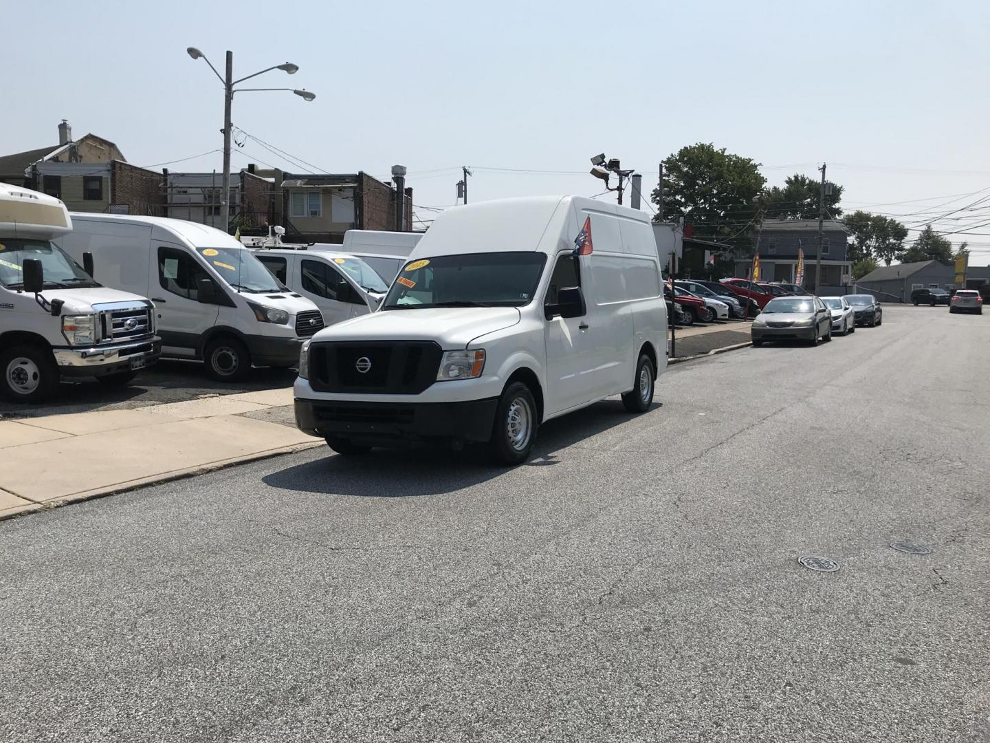 2015 White /Gray Nissan NV Cargo S (1N6BF0LX6FN) with an 4.0 V6 engine, Automatic transmission, located at 577 Chester Pike, Prospect Park, PA, 19076, (610) 237-1015, 39.886154, -75.302338 - 15 Nissan NV 2500 Cargo Van: High roof, shelving, power locks and windows, new PA inspection, runs EXCELLENT! This vehicle comes inspected and has been given a bumper to bumper safety check. It is very clean, reliable, and well maintained. We offer a unique pay plan that is known for being the ea - Photo#1