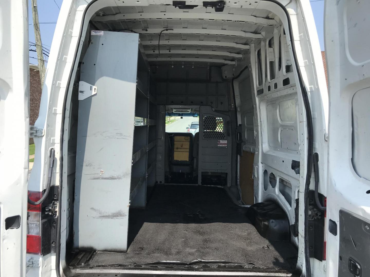 2015 White /Gray Nissan NV Cargo S (1N6BF0LX6FN) with an 4.0 V6 engine, Automatic transmission, located at 577 Chester Pike, Prospect Park, PA, 19076, (610) 237-1015, 39.886154, -75.302338 - 15 Nissan NV 2500 Cargo Van: High roof, shelving, power locks and windows, new PA inspection, runs EXCELLENT! This vehicle comes inspected and has been given a bumper to bumper safety check. It is very clean, reliable, and well maintained. We offer a unique pay plan that is known for being the ea - Photo#15