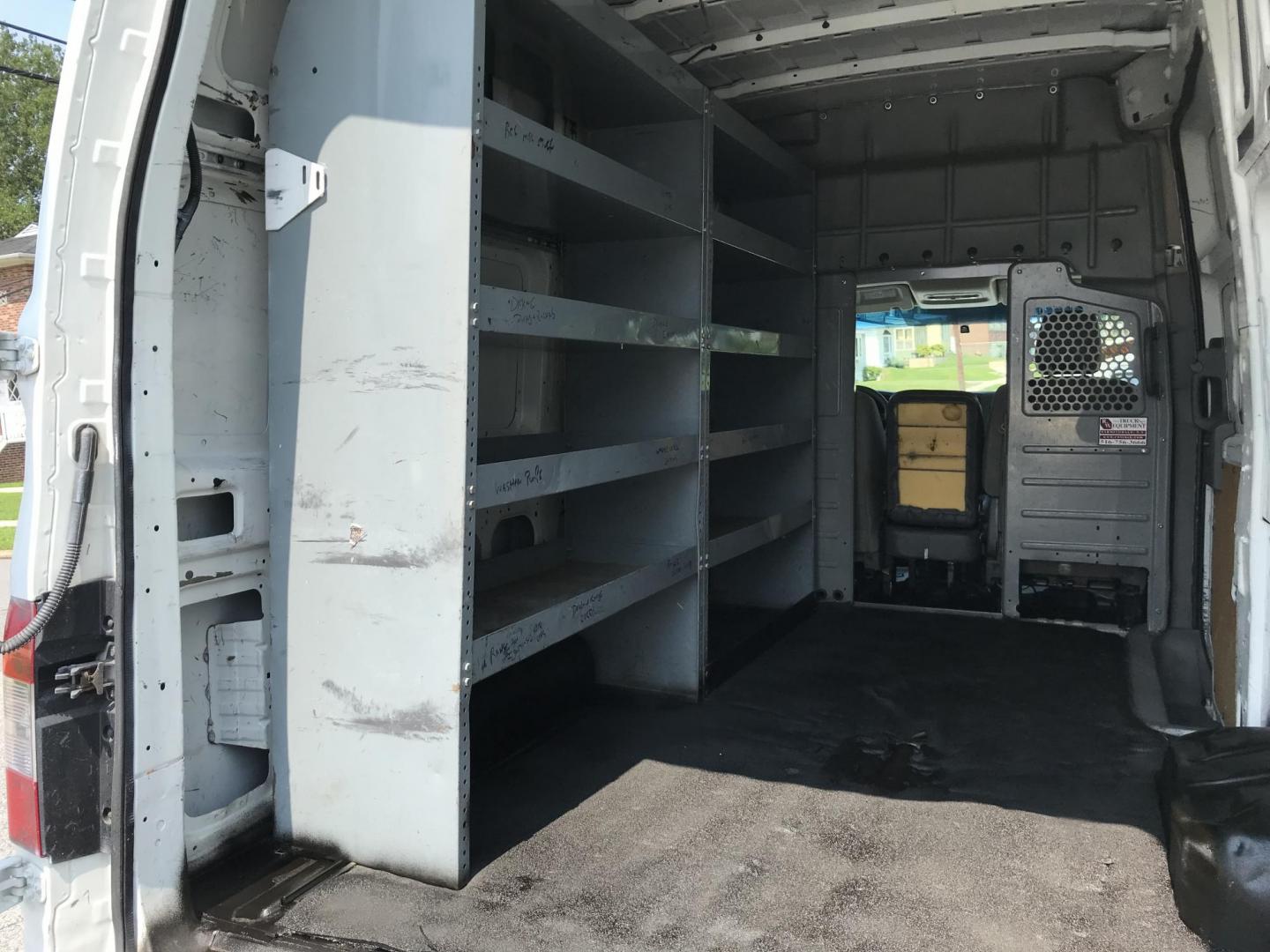 2015 White /Gray Nissan NV Cargo S (1N6BF0LX6FN) with an 4.0 V6 engine, Automatic transmission, located at 577 Chester Pike, Prospect Park, PA, 19076, (610) 237-1015, 39.886154, -75.302338 - 15 Nissan NV 2500 Cargo Van: High roof, shelving, power locks and windows, new PA inspection, runs EXCELLENT! This vehicle comes inspected and has been given a bumper to bumper safety check. It is very clean, reliable, and well maintained. We offer a unique pay plan that is known for being the ea - Photo#16