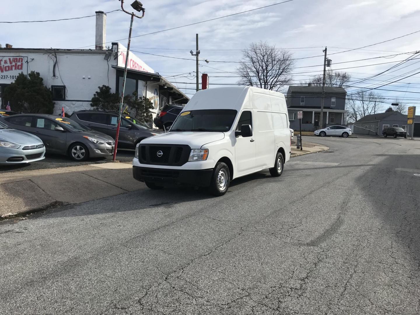 2015 White /Gray Nissan NV Cargo S (1N6BF0LX6FN) with an 4.0 V6 engine, Automatic transmission, located at 577 Chester Pike, Prospect Park, PA, 19076, (610) 237-1015, 39.886154, -75.302338 - 15 Nissan NV 2500 Cargo Van: High roof, shelving, power locks and windows, new PA inspection, runs EXCELLENT! This vehicle comes inspected and has been given a bumper to bumper safety check. It is very clean, reliable, and well maintained. We offer a unique pay plan that is known for being the ea - Photo#1