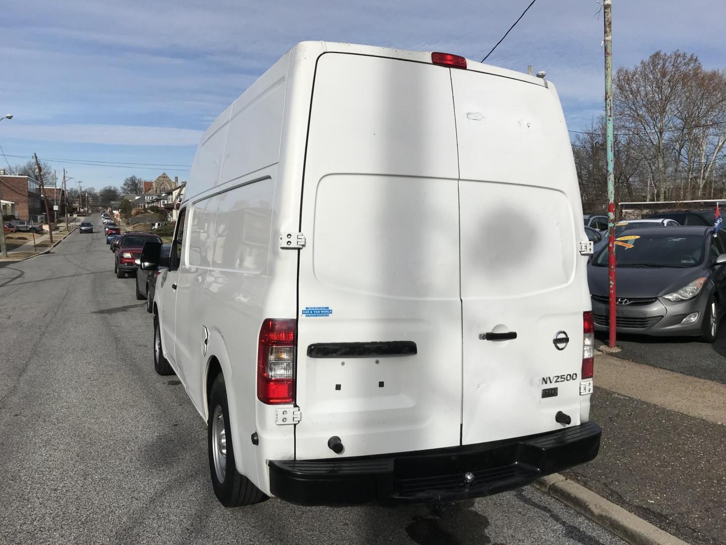 2015 White /Gray Nissan NV Cargo S (1N6BF0LX6FN) with an 4.0 V6 engine, Automatic transmission, located at 577 Chester Pike, Prospect Park, PA, 19076, (610) 237-1015, 39.886154, -75.302338 - 15 Nissan NV 2500 Cargo Van: High roof, shelving, power locks and windows, new PA inspection, runs EXCELLENT! This vehicle comes inspected and has been given a bumper to bumper safety check. It is very clean, reliable, and well maintained. We offer a unique pay plan that is known for being the ea - Photo#5