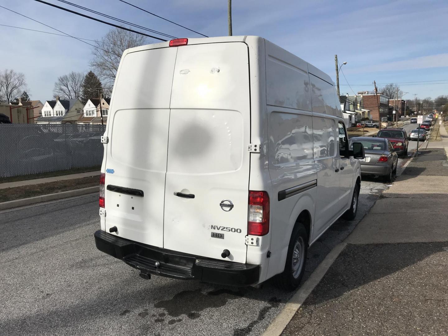 2015 White /Gray Nissan NV Cargo S (1N6BF0LX6FN) with an 4.0 V6 engine, Automatic transmission, located at 577 Chester Pike, Prospect Park, PA, 19076, (610) 237-1015, 39.886154, -75.302338 - 15 Nissan NV 2500 Cargo Van: High roof, shelving, power locks and windows, new PA inspection, runs EXCELLENT! This vehicle comes inspected and has been given a bumper to bumper safety check. It is very clean, reliable, and well maintained. We offer a unique pay plan that is known for being the ea - Photo#4