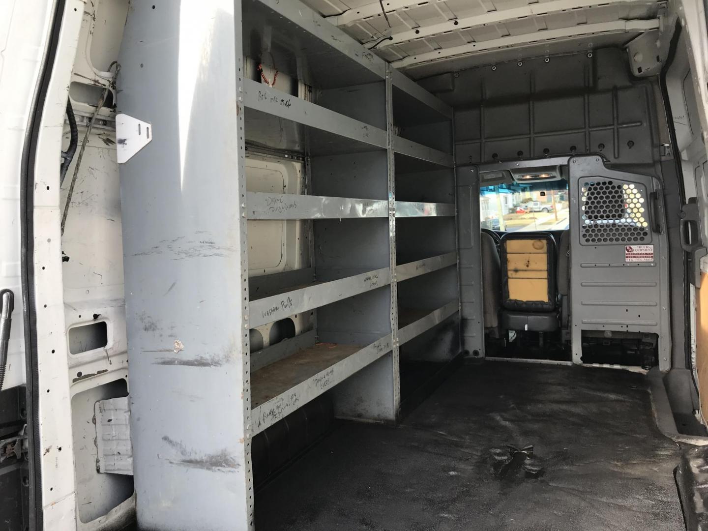 2015 White /Gray Nissan NV Cargo S (1N6BF0LX6FN) with an 4.0 V6 engine, Automatic transmission, located at 577 Chester Pike, Prospect Park, PA, 19076, (610) 237-1015, 39.886154, -75.302338 - 15 Nissan NV 2500 Cargo Van: High roof, shelving, power locks and windows, new PA inspection, runs EXCELLENT! This vehicle comes inspected and has been given a bumper to bumper safety check. It is very clean, reliable, and well maintained. We offer a unique pay plan that is known for being the ea - Photo#13