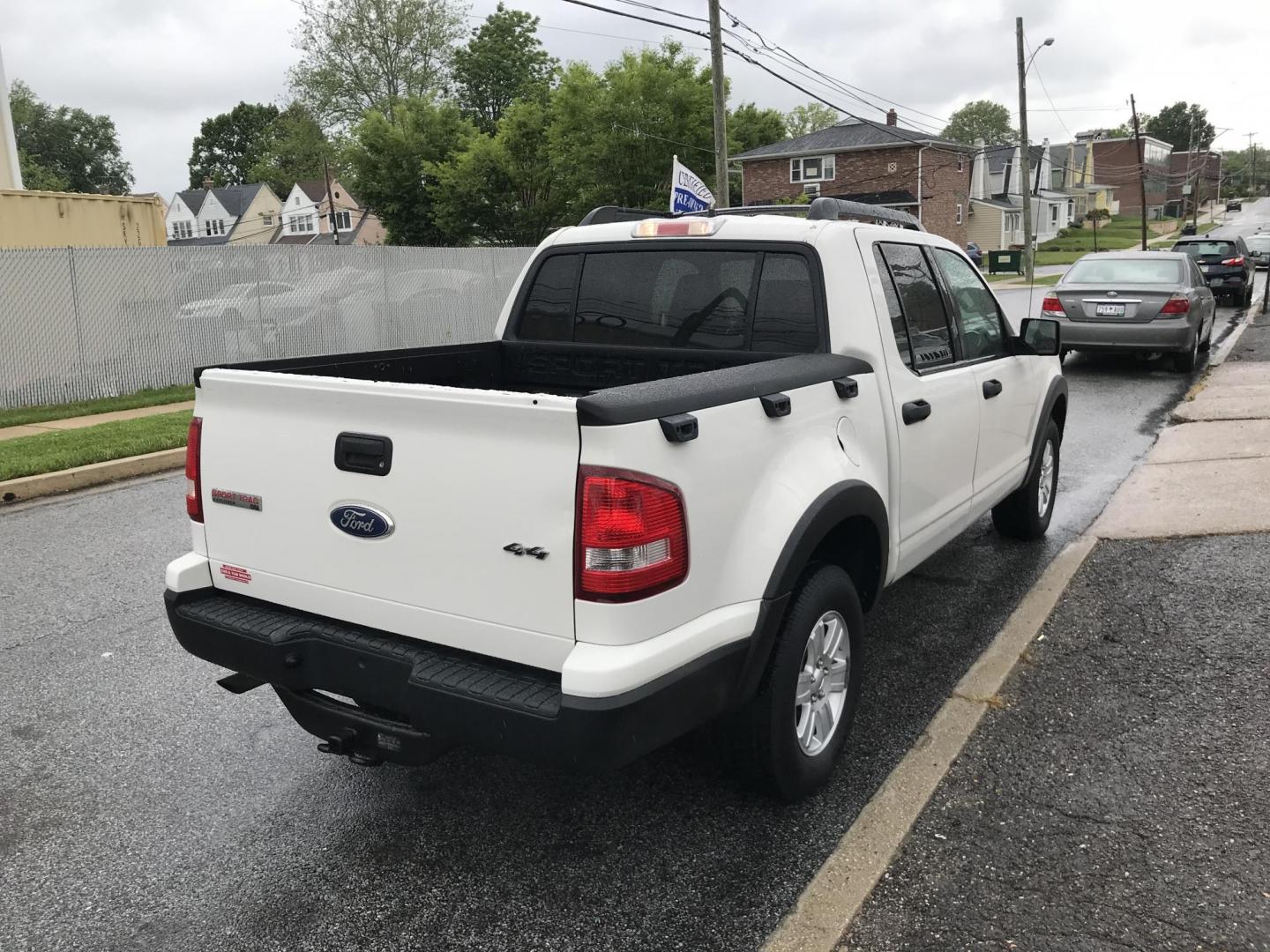 2010 White /Gray Ford Explorer Sport Trac XLT (1FMEU5BE9AU) with an 4.0 V6 engine, Automatic transmission, located at 577 Chester Pike, Prospect Park, PA, 19076, (610) 237-1015, 39.886154, -75.302338 - 2010 Ford Explorer Sport Trac XLT: 4x4, new PA inspection, SUPER clean, runs LIKE NEW! This vehicle comes inspected and has been given a bumper to bumper safety check. It is very clean, reliable, and well maintained. We offer a unique pay plan that is known for being the easiest and fastest finan - Photo#4