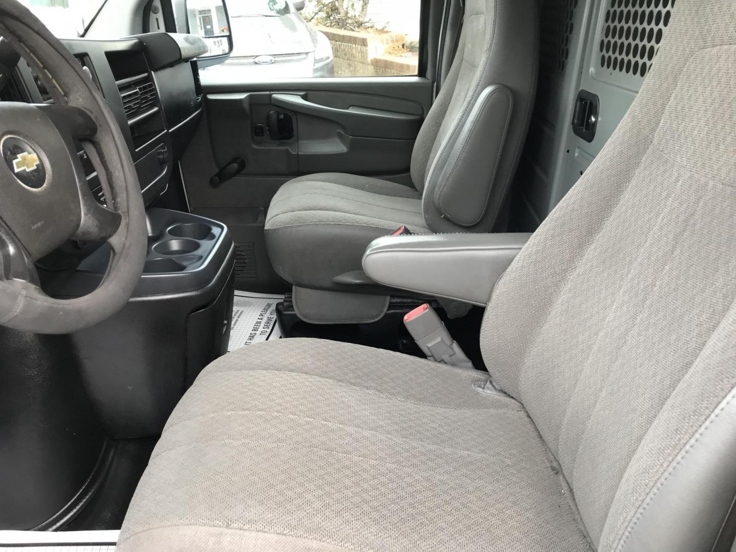 2012 White /Gray Chevrolet Express 2500 (1GCWGFCA8C1) with an 4.8 V8 engine, Automatic transmission, located at 577 Chester Pike, Prospect Park, PA, 19076, (610) 237-1015, 39.886154, -75.302338 - 2012 Chevrolet Express 2500 Cargo Van: new PA inspection, partition, no rear or side windows, runs LIKE NEW! This vehicle comes inspected and has been given a bumper to bumper safety check. It is very clean, reliable, and well maintained. We offer a unique pay plan that is known for being the eas - Photo#8