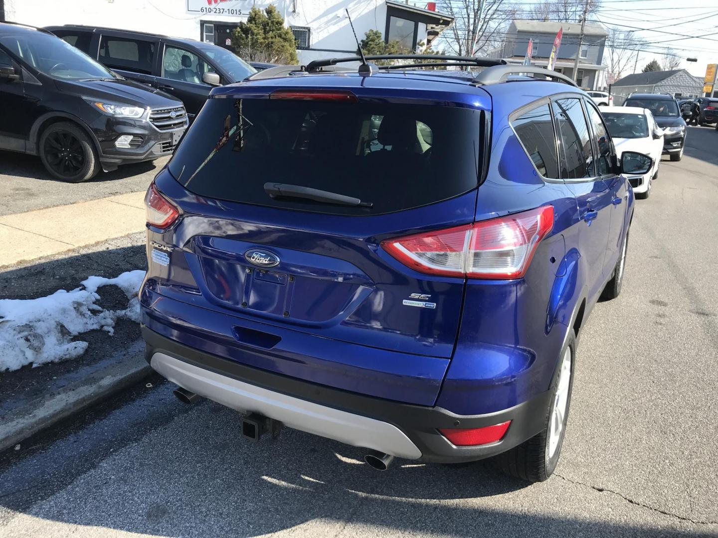 2014 Blue /Gray Ford Escape SE (1FMCU9G94EU) with an 2.0 V4 engine, Automatic transmission, located at 577 Chester Pike, Prospect Park, PA, 19076, (610) 237-1015, 39.886154, -75.302338 - Photo#6