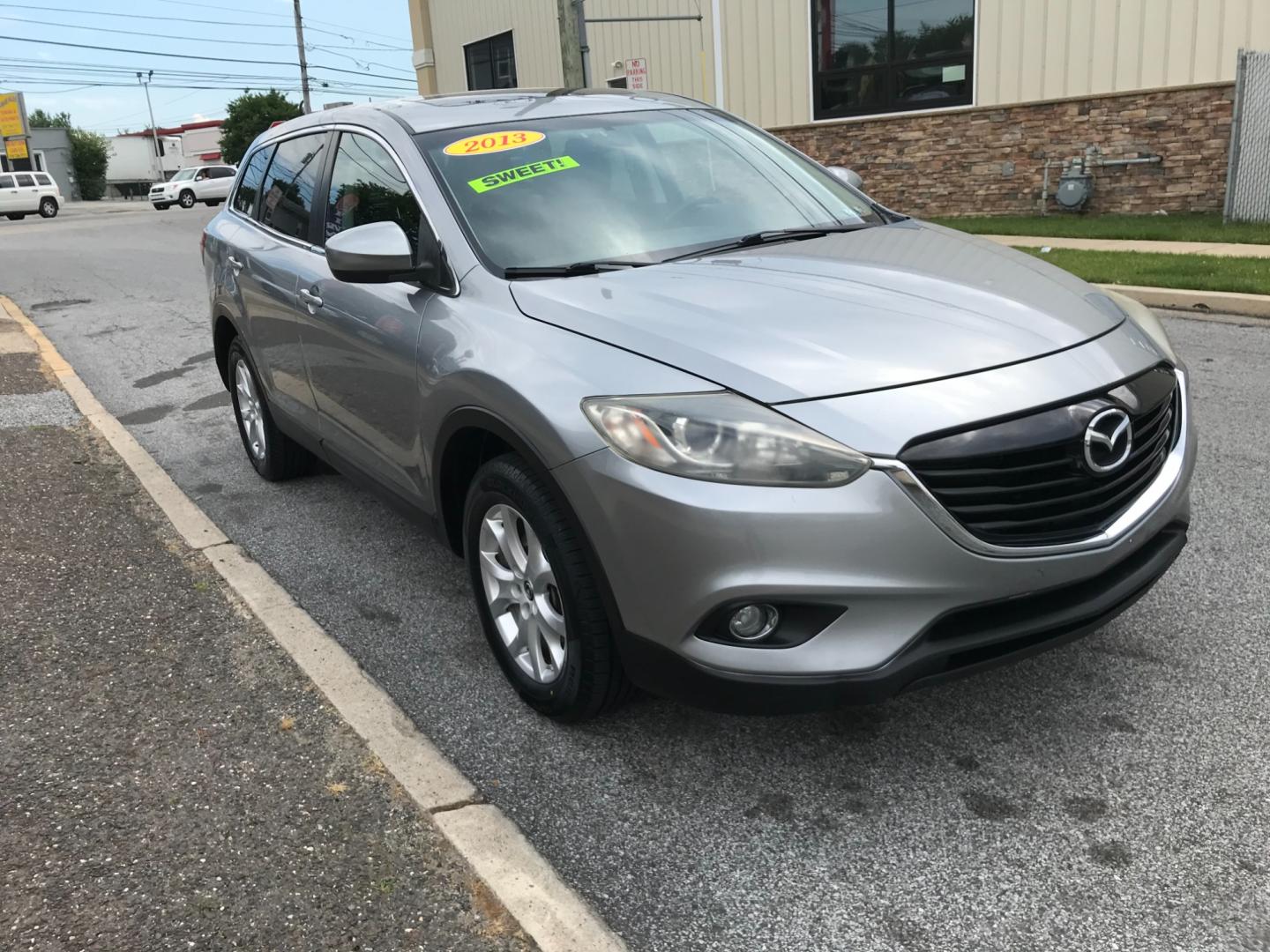 2013 Silver /Black Mazda CX-9 Touring (JM3TB3CV6D0) with an 3.7 V6 engine, Automatic transmission, located at 577 Chester Pike, Prospect Park, PA, 19076, (610) 237-1015, 39.886154, -75.302338 - Photo#3