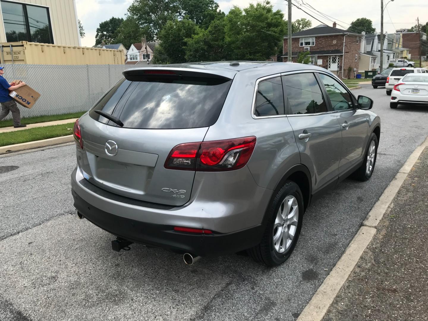 2013 Silver /Black Mazda CX-9 Touring (JM3TB3CV6D0) with an 3.7 V6 engine, Automatic transmission, located at 577 Chester Pike, Prospect Park, PA, 19076, (610) 237-1015, 39.886154, -75.302338 - Photo#4