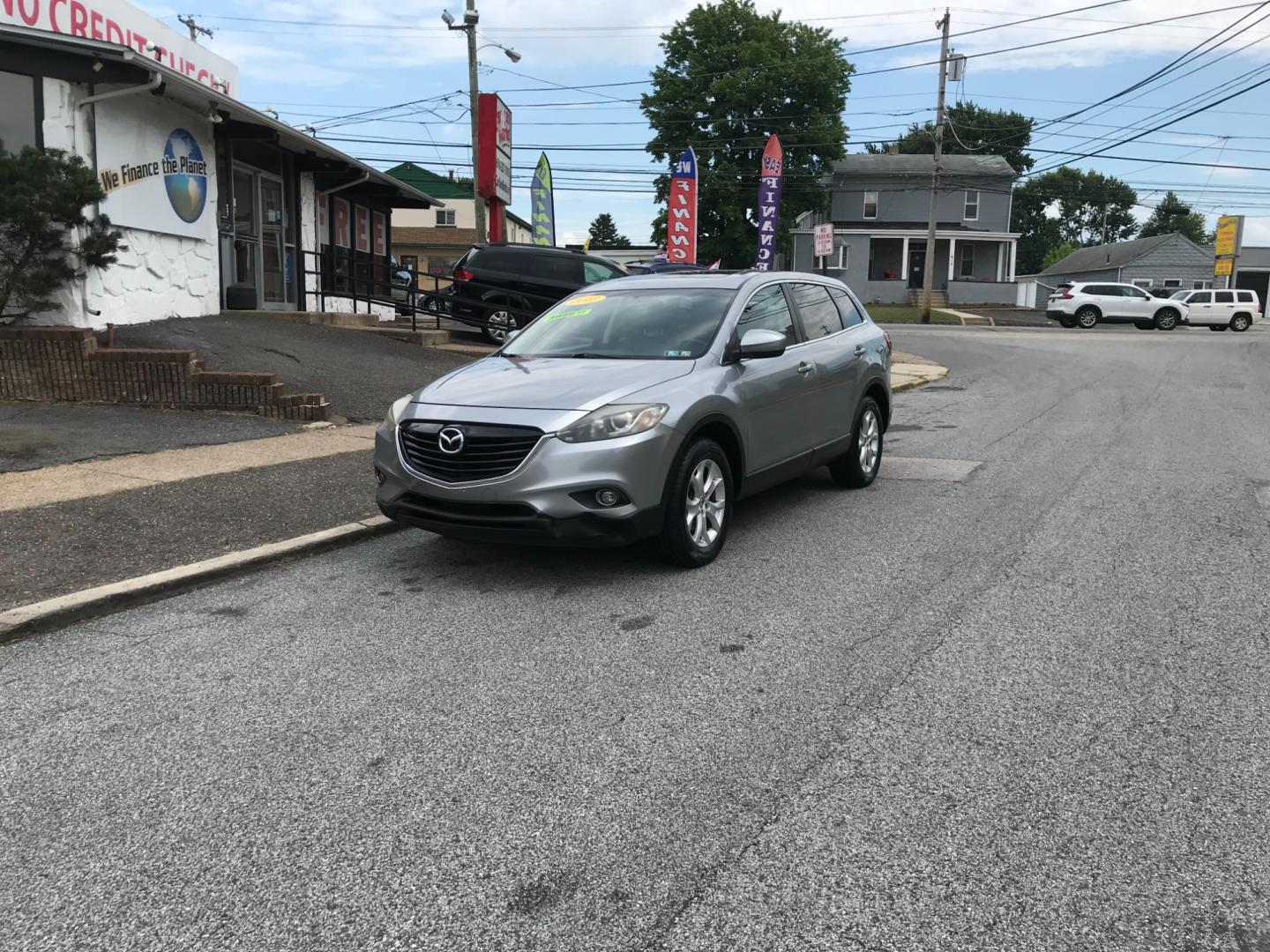2013 Silver /Black Mazda CX-9 Touring (JM3TB3CV6D0) with an 3.7 V6 engine, Automatic transmission, located at 577 Chester Pike, Prospect Park, PA, 19076, (610) 237-1015, 39.886154, -75.302338 - Photo#1