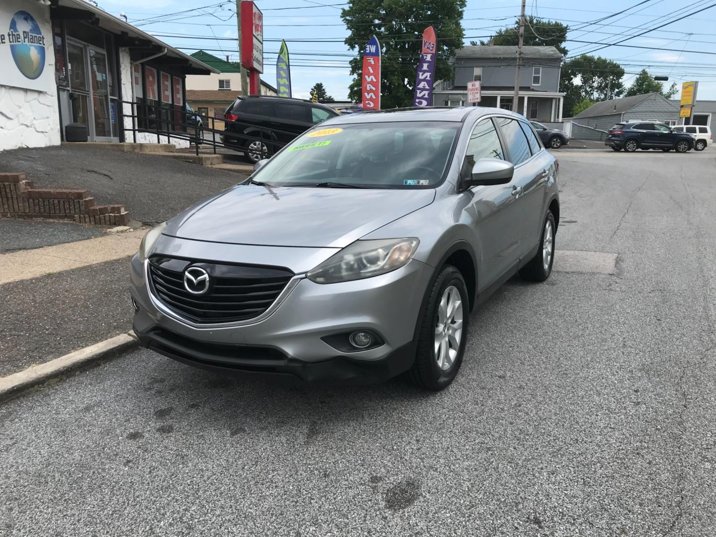 2013 Silver /Black Mazda CX-9 Touring (JM3TB3CV6D0) with an 3.7 V6 engine, Automatic transmission, located at 577 Chester Pike, Prospect Park, PA, 19076, (610) 237-1015, 39.886154, -75.302338 - Photo#2