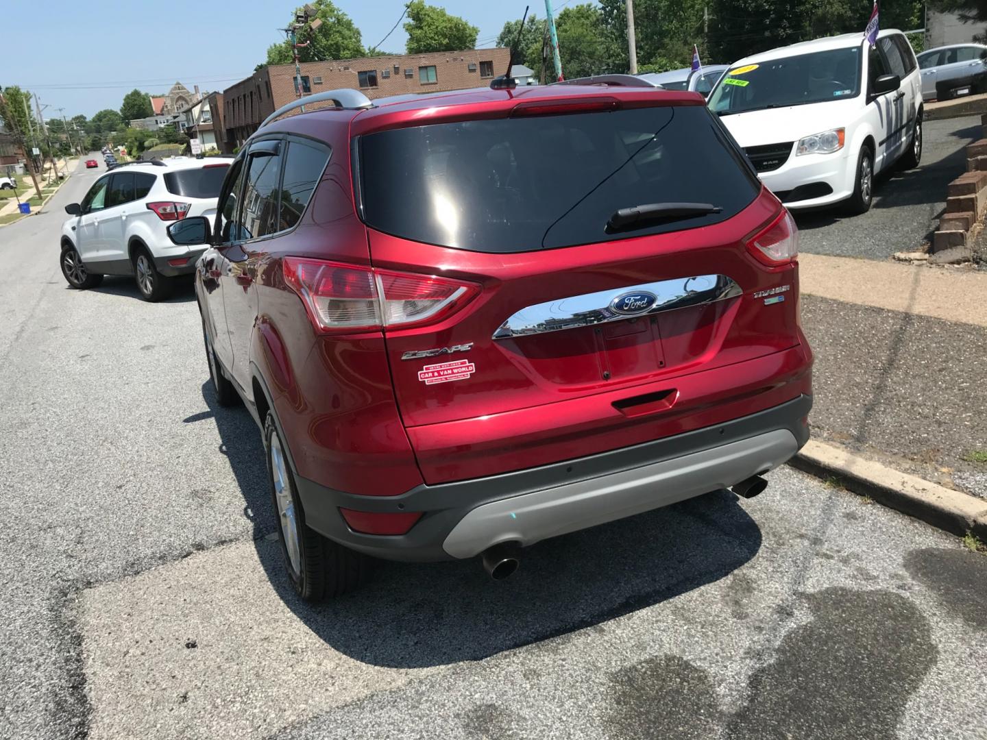 2014 Red /Gray Ford Escape Titanium (1FMCU9J99EU) with an 2.0 V4 engine, Automatic transmission, located at 577 Chester Pike, Prospect Park, PA, 19076, (610) 237-1015, 39.886154, -75.302338 - Photo#5