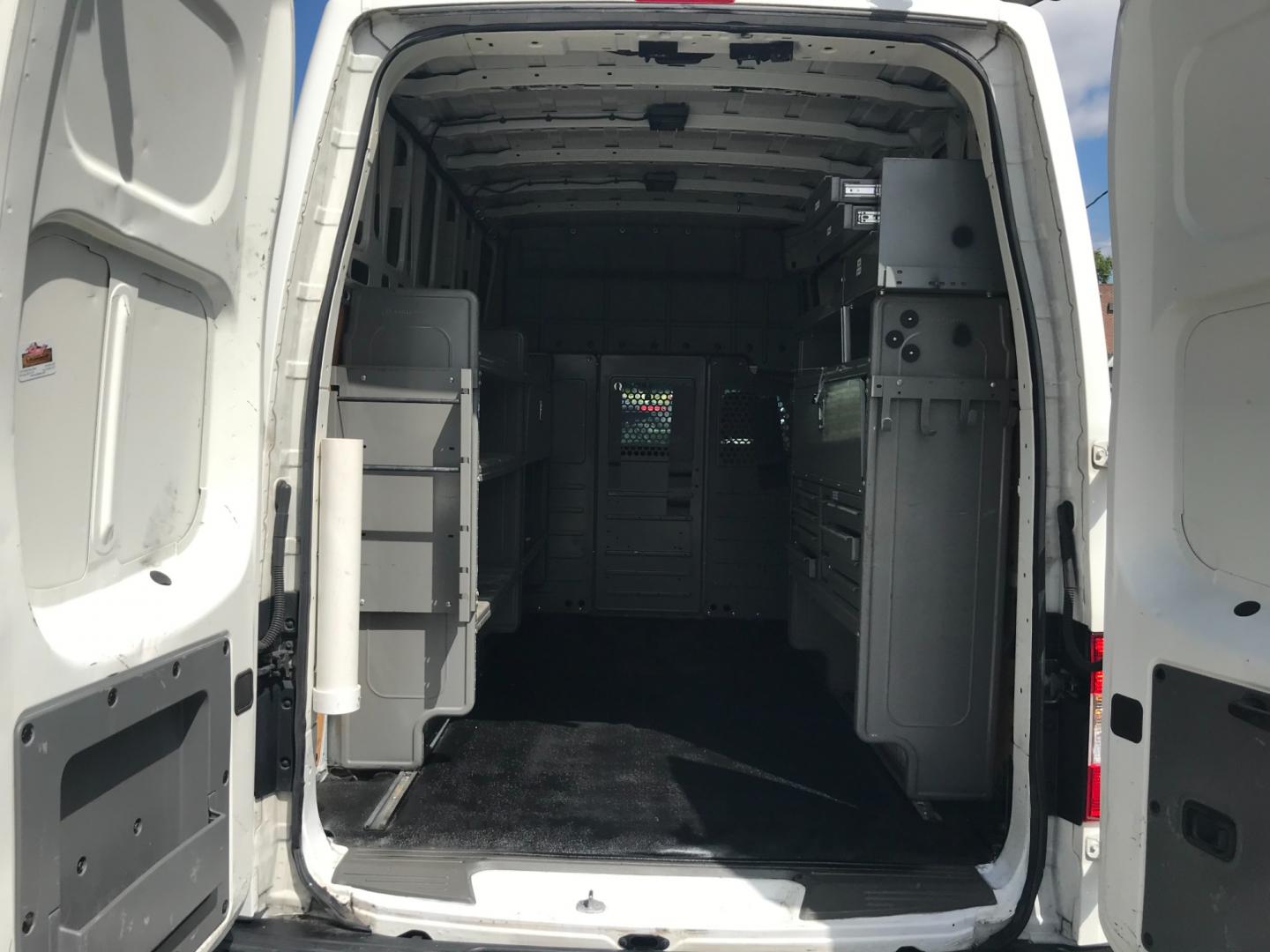 2018 White /Gray Nissan NV Cargo SV (1N6BF0LYXJN) with an 4.0 V6 engine, Automatic transmission, located at 577 Chester Pike, Prospect Park, PA, 19076, (610) 237-1015, 39.886154, -75.302338 - 2018 Nissan NV 2500 SV HD: High roof, ladder racks, multiple pieces of shelving, backup camera, new PA inspection, SUPER CLEAN, runs LIKE NEW! This vehicle comes inspected and has been given a bumper to bumper safety check. It is very clean, reliable, and well maintained. We offer a unique pay pl - Photo#17