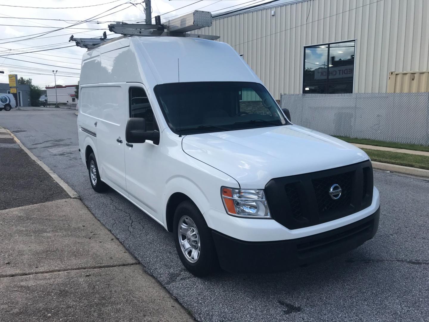 2018 White /Gray Nissan NV Cargo SV (1N6BF0LYXJN) with an 4.0 V6 engine, Automatic transmission, located at 577 Chester Pike, Prospect Park, PA, 19076, (610) 237-1015, 39.886154, -75.302338 - 2018 Nissan NV 2500 SV HD: High roof, ladder racks, multiple pieces of shelving, backup camera, new PA inspection, SUPER CLEAN, runs LIKE NEW! This vehicle comes inspected and has been given a bumper to bumper safety check. It is very clean, reliable, and well maintained. We offer a unique pay pl - Photo#3