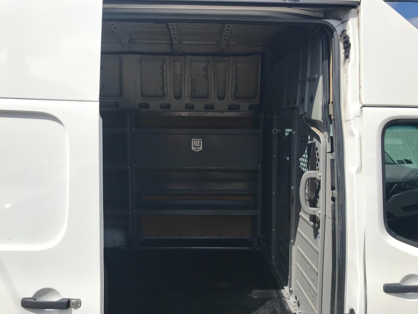 2018 White /Gray Nissan NV Cargo SV (1N6BF0LYXJN) with an 4.0 V6 engine, Automatic transmission, located at 577 Chester Pike, Prospect Park, PA, 19076, (610) 237-1015, 39.886154, -75.302338 - 2018 Nissan NV 2500 SV HD: High roof, ladder racks, multiple pieces of shelving, backup camera, new PA inspection, SUPER CLEAN, runs LIKE NEW! This vehicle comes inspected and has been given a bumper to bumper safety check. It is very clean, reliable, and well maintained. We offer a unique pay pl - Photo#20