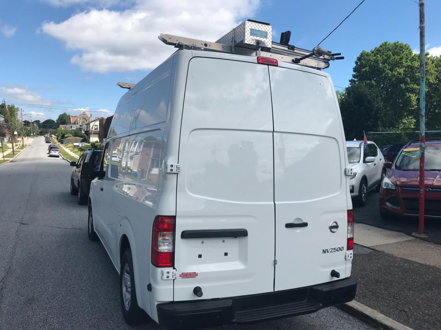 2018 White /Gray Nissan NV Cargo SV (1N6BF0LYXJN) with an 4.0 V6 engine, Automatic transmission, located at 577 Chester Pike, Prospect Park, PA, 19076, (610) 237-1015, 39.886154, -75.302338 - 2018 Nissan NV 2500 SV HD: High roof, ladder racks, multiple pieces of shelving, backup camera, new PA inspection, SUPER CLEAN, runs LIKE NEW! This vehicle comes inspected and has been given a bumper to bumper safety check. It is very clean, reliable, and well maintained. We offer a unique pay pl - Photo#5