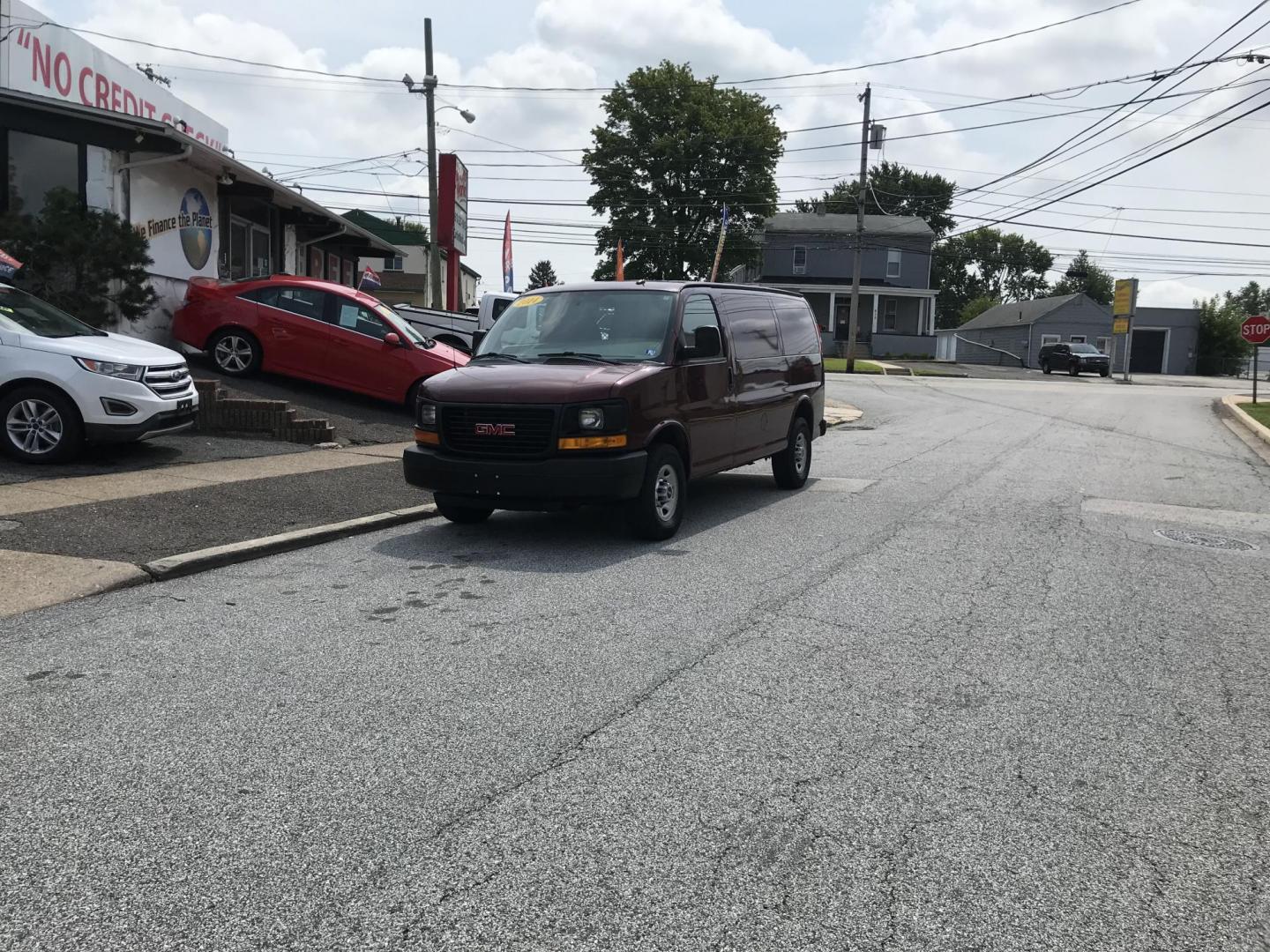 2014 Maroon /Gray GMC Savana 3500 (1GTZ7TCA0E1) with an 4.8 V8 engine, Automatic transmission, located at 577 Chester Pike, Prospect Park, PA, 19076, (610) 237-1015, 39.886154, -75.302338 - 2014 GMC Savana 3500 Cargo Van: partition with door, new PA inspection, power locks and windows, runs LIKE NEW! This vehicle comes inspected and has been given a bumper to bumper safety check. It is very clean, reliable, and well maintained. We offer a unique pay plan that is known for being the - Photo#1