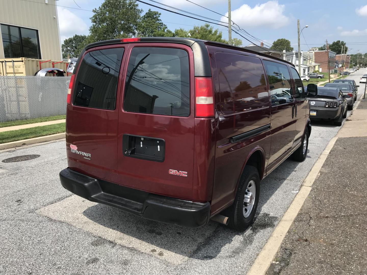2014 Maroon /Gray GMC Savana 3500 (1GTZ7TCA0E1) with an 4.8 V8 engine, Automatic transmission, located at 577 Chester Pike, Prospect Park, PA, 19076, (610) 237-1015, 39.886154, -75.302338 - 2014 GMC Savana 3500 Cargo Van: partition with door, new PA inspection, power locks and windows, runs LIKE NEW! This vehicle comes inspected and has been given a bumper to bumper safety check. It is very clean, reliable, and well maintained. We offer a unique pay plan that is known for being the - Photo#4