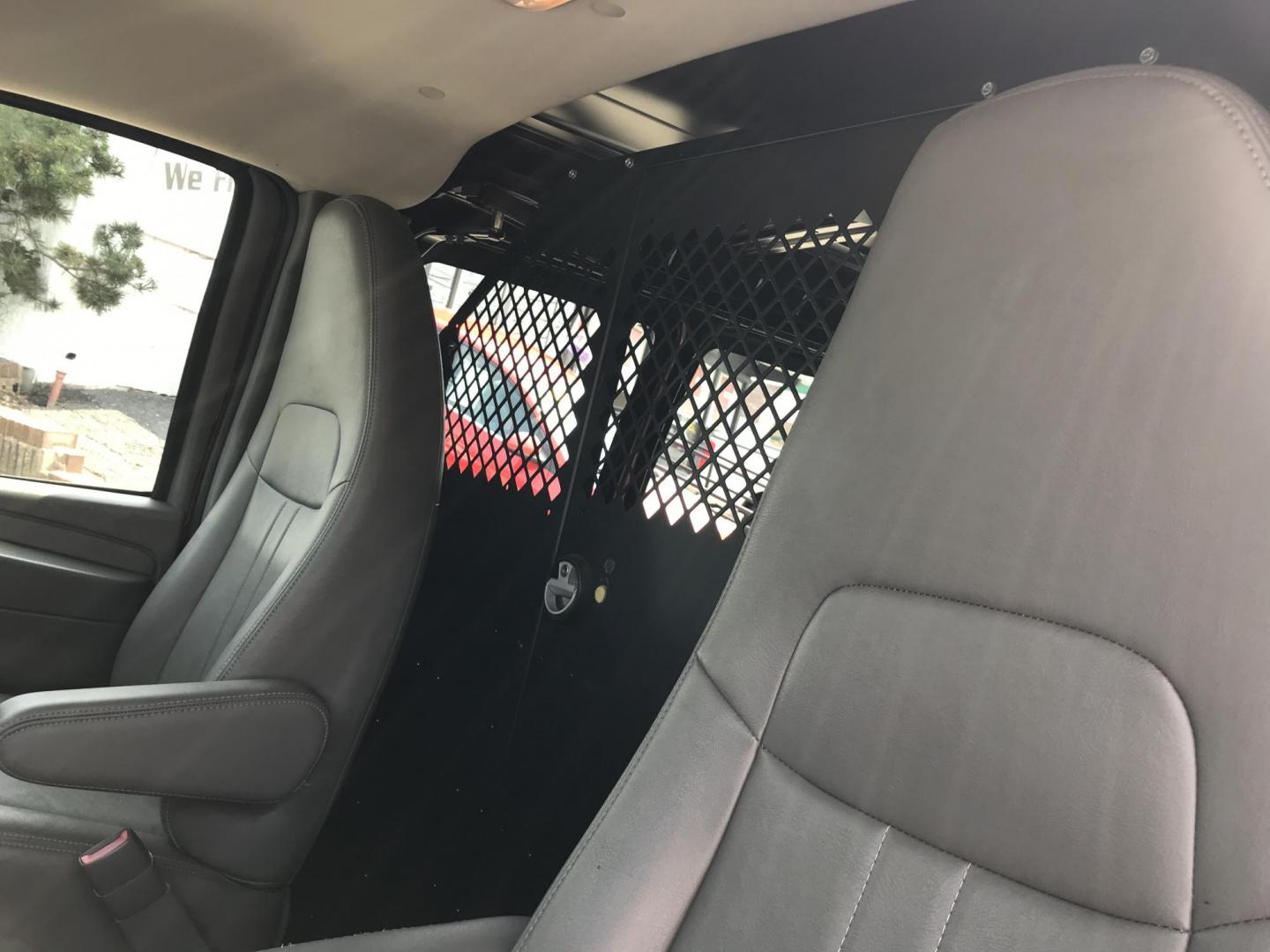 2014 Maroon /Gray GMC Savana 3500 (1GTZ7TCA0E1) with an 4.8 V8 engine, Automatic transmission, located at 577 Chester Pike, Prospect Park, PA, 19076, (610) 237-1015, 39.886154, -75.302338 - 2014 GMC Savana 3500 Cargo Van: partition with door, new PA inspection, power locks and windows, runs LIKE NEW! This vehicle comes inspected and has been given a bumper to bumper safety check. It is very clean, reliable, and well maintained. We offer a unique pay plan that is known for being the - Photo#10