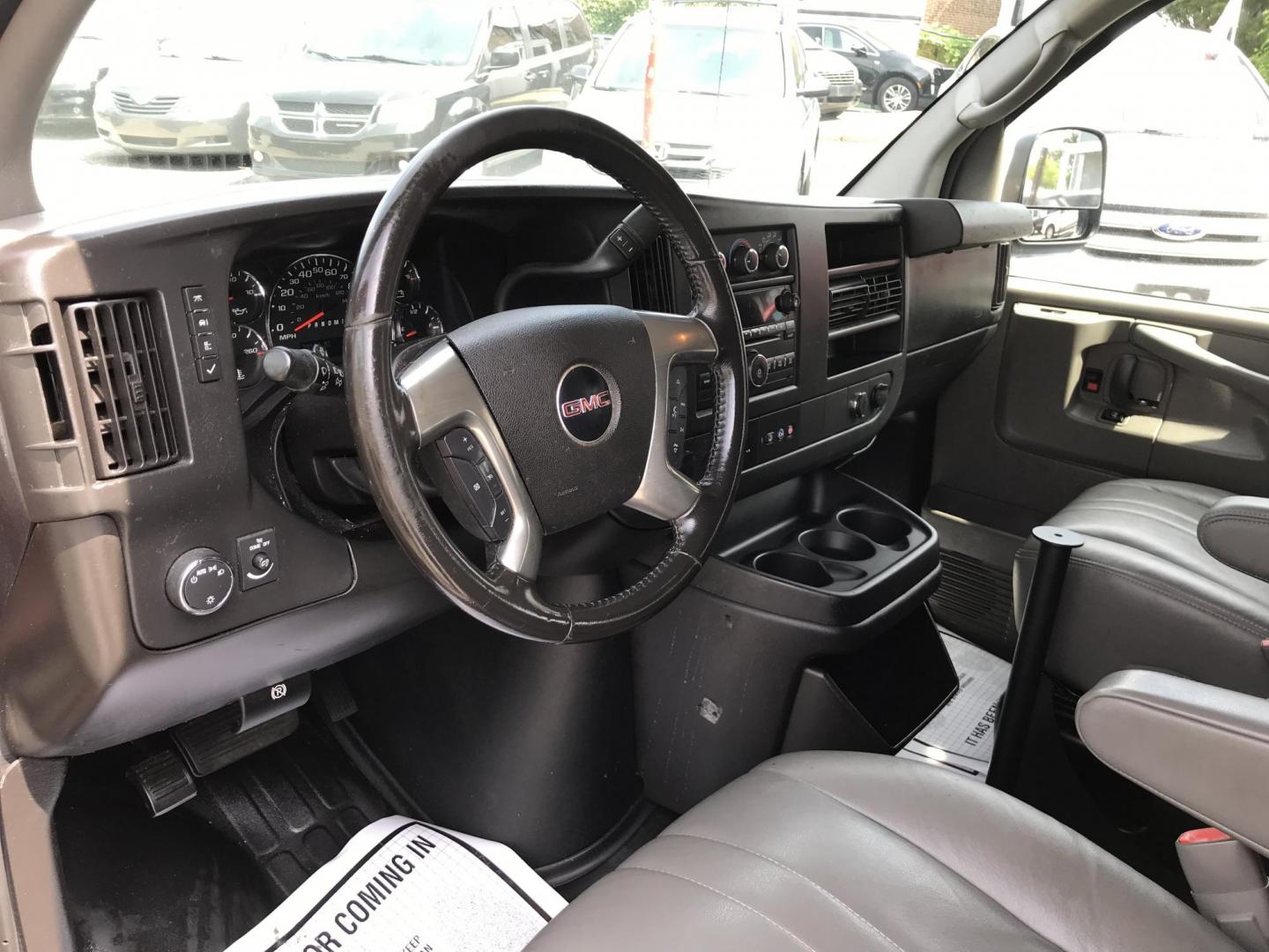 2014 Maroon /Gray GMC Savana 3500 (1GTZ7TCA0E1) with an 4.8 V8 engine, Automatic transmission, located at 577 Chester Pike, Prospect Park, PA, 19076, (610) 237-1015, 39.886154, -75.302338 - 2014 GMC Savana 3500 Cargo Van: partition with door, new PA inspection, power locks and windows, runs LIKE NEW! This vehicle comes inspected and has been given a bumper to bumper safety check. It is very clean, reliable, and well maintained. We offer a unique pay plan that is known for being the - Photo#11