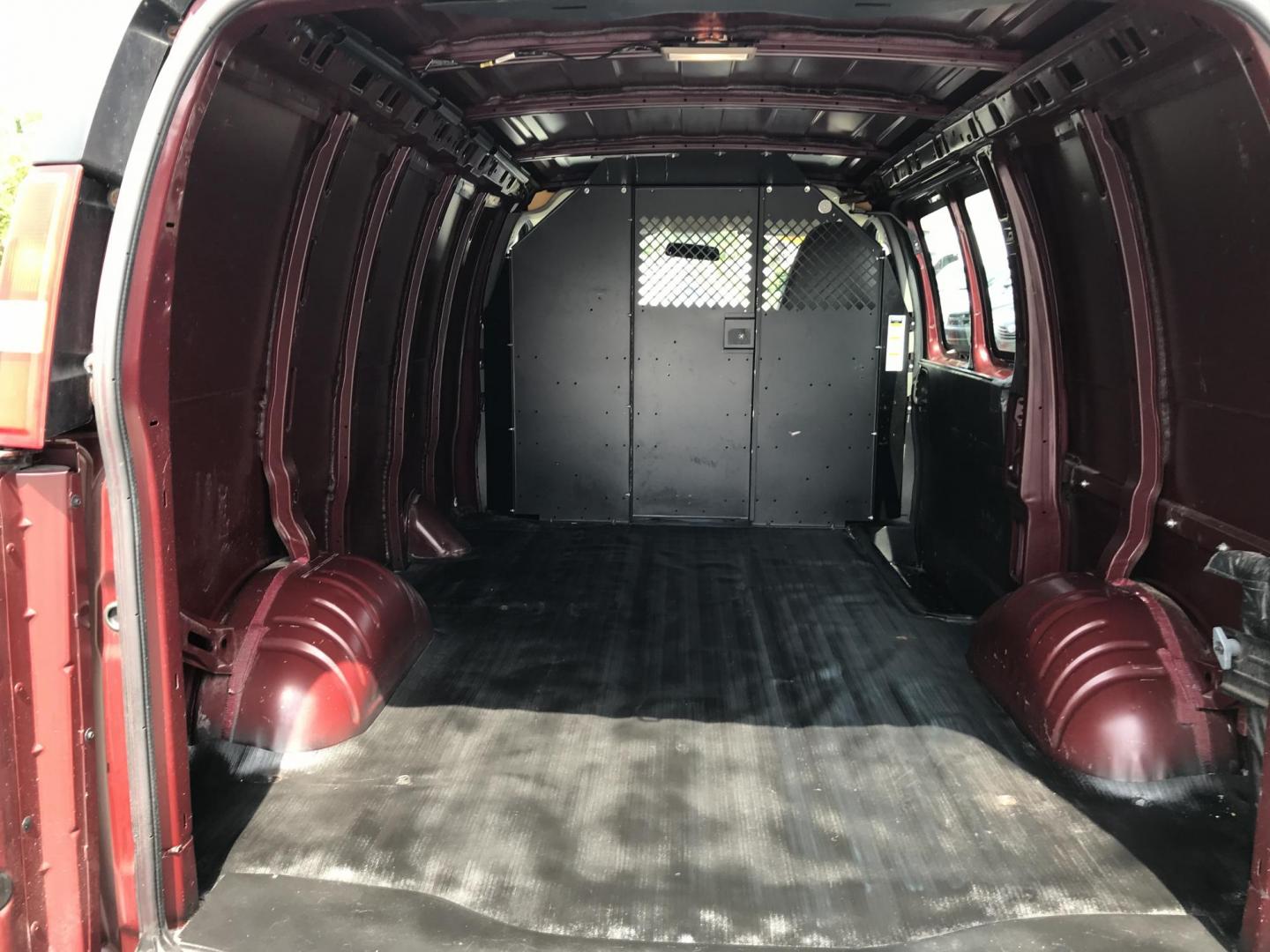 2014 Maroon /Gray GMC Savana 3500 (1GTZ7TCA0E1) with an 4.8 V8 engine, Automatic transmission, located at 577 Chester Pike, Prospect Park, PA, 19076, (610) 237-1015, 39.886154, -75.302338 - 2014 GMC Savana 3500 Cargo Van: partition with door, new PA inspection, power locks and windows, runs LIKE NEW! This vehicle comes inspected and has been given a bumper to bumper safety check. It is very clean, reliable, and well maintained. We offer a unique pay plan that is known for being the - Photo#15
