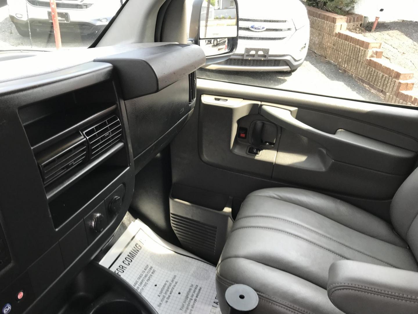 2014 Maroon /Gray GMC Savana 3500 (1GTZ7TCA0E1) with an 4.8 V8 engine, Automatic transmission, located at 577 Chester Pike, Prospect Park, PA, 19076, (610) 237-1015, 39.886154, -75.302338 - 2014 GMC Savana 3500 Cargo Van: partition with door, new PA inspection, power locks and windows, runs LIKE NEW! This vehicle comes inspected and has been given a bumper to bumper safety check. It is very clean, reliable, and well maintained. We offer a unique pay plan that is known for being the - Photo#14
