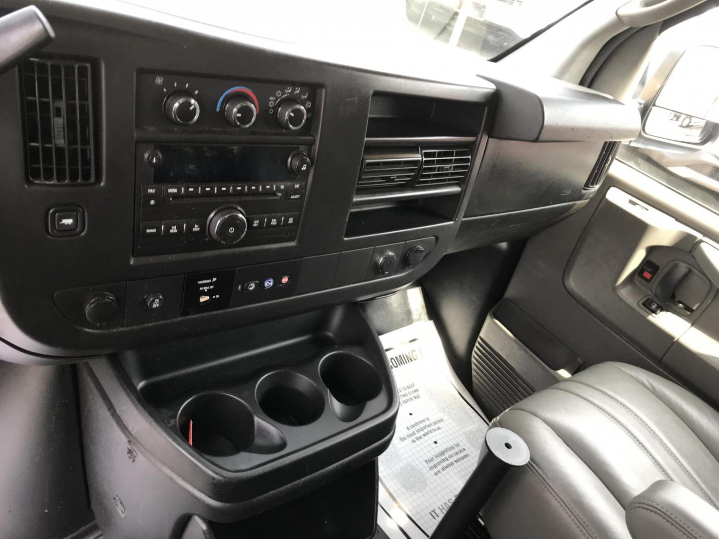 2014 Maroon /Gray GMC Savana 3500 (1GTZ7TCA0E1) with an 4.8 V8 engine, Automatic transmission, located at 577 Chester Pike, Prospect Park, PA, 19076, (610) 237-1015, 39.886154, -75.302338 - 2014 GMC Savana 3500 Cargo Van: partition with door, new PA inspection, power locks and windows, runs LIKE NEW! This vehicle comes inspected and has been given a bumper to bumper safety check. It is very clean, reliable, and well maintained. We offer a unique pay plan that is known for being the - Photo#13