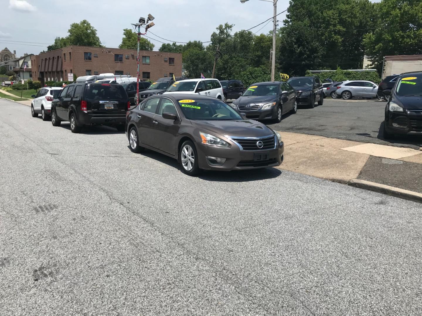 2014 Brown /Beige Nissan Altima 2.5 (1N4AL3AP3EC) with an 2.5 V4 engine, Automatic transmission, located at 577 Chester Pike, Prospect Park, PA, 19076, (610) 237-1015, 39.886154, -75.302338 - 2014 Nissan Altima: New PA inspection, great on gas, SUPER CLEAN, runs LIKE NEW! This vehicle comes inspected and has been given a bumper to bumper safety check. It is very clean, reliable, and well maintained. We offer a unique pay plan that is known for being the easiest and fastest financing o - Photo#1