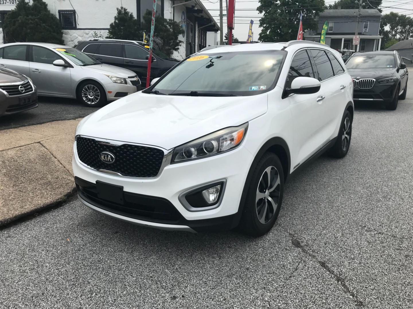 2016 White /Black Kia Sorento EX (5XYPHDA58GG) with an 3.3 V6 engine, Automatic transmission, located at 577 Chester Pike, Prospect Park, PA, 19076, (610) 237-1015, 39.886154, -75.302338 - 2016 Kia Sorento EX: Only 119k miles, 3rd row seating, AWD, backup camera, tow hitch, SUPER CLEAN, runs LIKE NEW! This vehicle comes inspected and has been given a bumper to bumper safety check. It is very clean, reliable, and well maintained. We offer a unique pay plan that is known for being th - Photo#2