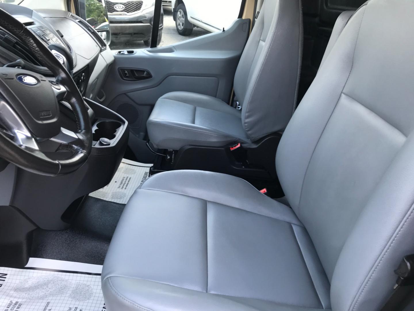 2017 Tan /Gray Ford Transit 150 (1FTYE1YM2HK) with an 3.7 V6 engine, Automatic transmission, located at 577 Chester Pike, Prospect Park, PA, 19076, (610) 237-1015, 39.886154, -75.302338 - 2017 Ford Transit 150 Low Roof: Nice ladder racks that drop down, multiple pieces of shelving, bulkhead, no windows, PA inspection, FLEET MAINTAINED, runs LIKE NEW! This vehicle comes inspected and has been given a bumper to bumper safety check. It is very clean, reliable, and well maintained. We - Photo#11